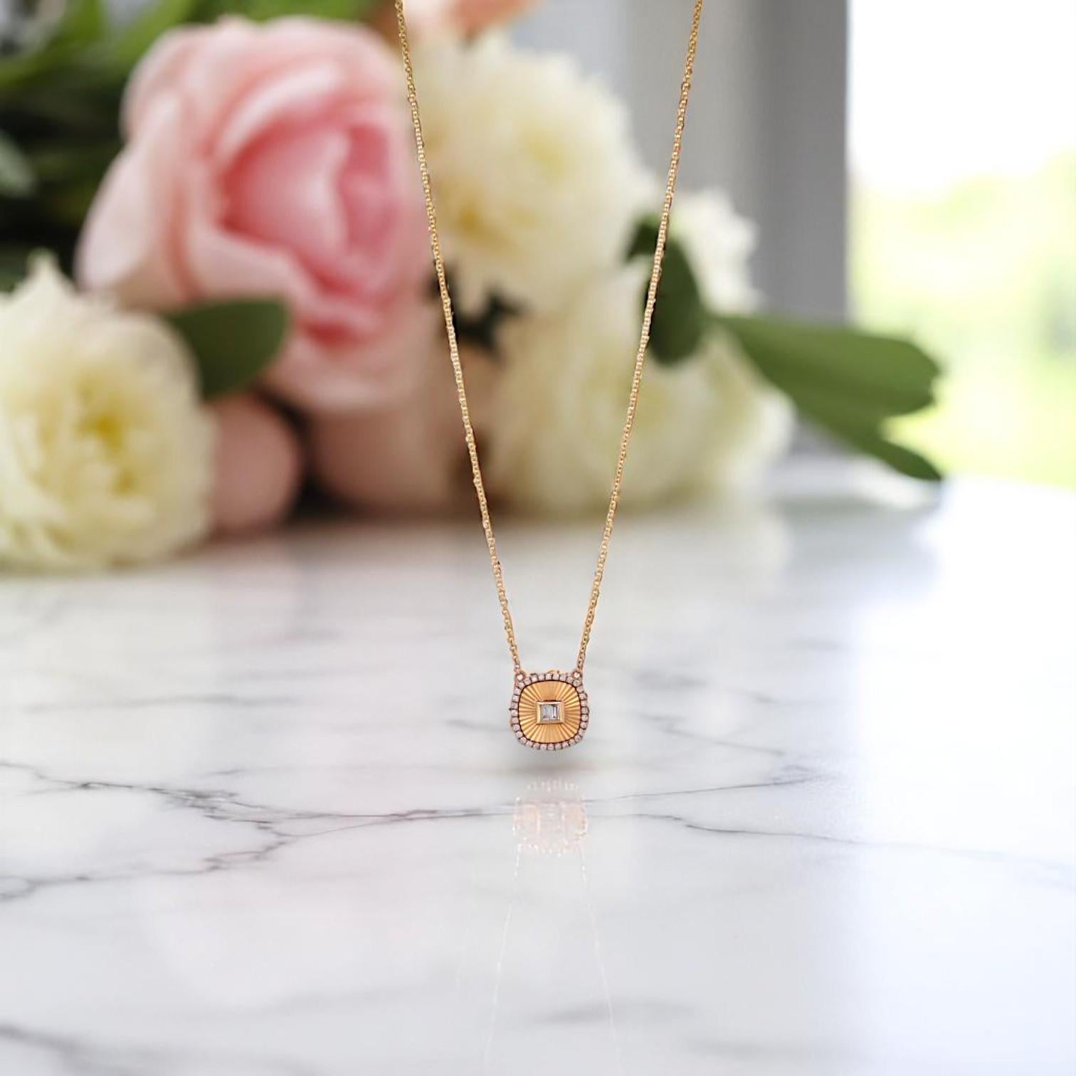 Sharp lines meet soft sparkle in the Lennox Necklace by Mountain Song Jeweler — a refined statement in modern luxury. Crafted in luminous 18k yellow gold, this radiant piece pairs .08 carats of natural baguette diamonds with .12 carats of brilliant