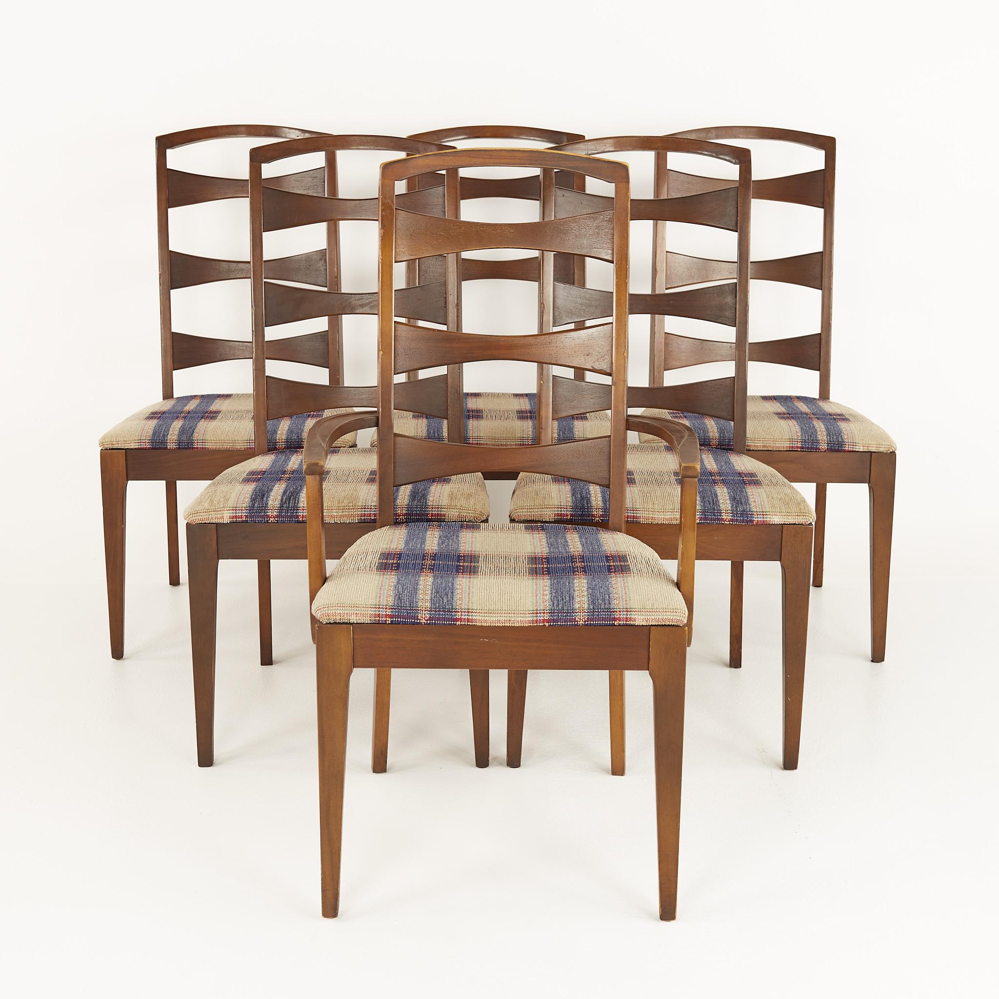 Lenoir House mid century walnut ladder back dining chairs - set of 6

These chairs measure: 20 wide x 21 deep x 41 inches high, with a seat height of 18.25 and arm height of 25.5 inches

?All pieces of furniture can be had in what we call
