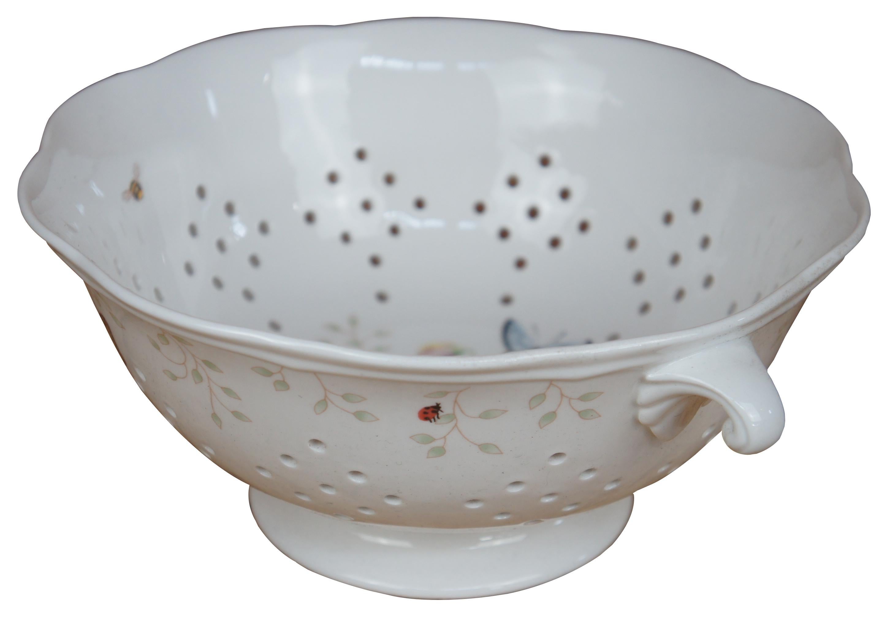 This ceramic colander or berry strainer bowl by Lenox in the Butterfly Meadow by Louise Le Luyer features pierced form, butterflies, flowers and bees. Size: 10