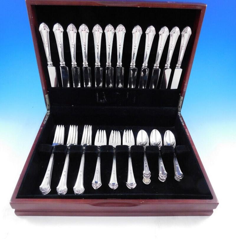 Lenox by Durgin Sterling Silver Flatware set - 48 pieces. This set includes:

12 Knives with blunt stainless blades, 8 1/2