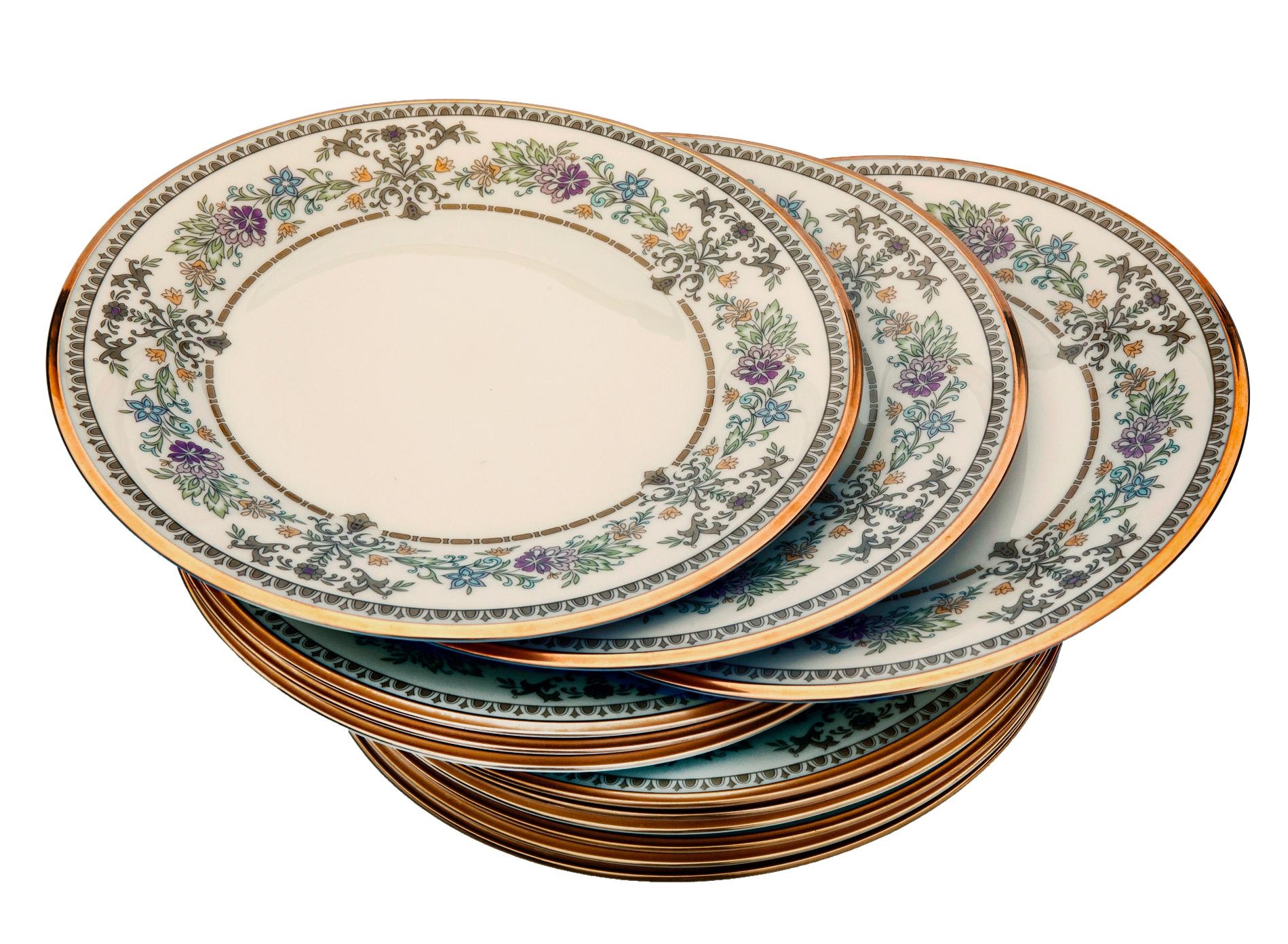 Classic Lenox china pattern “castle garden” from the 1970's in shades of pink, yellow, green on ivory background. 
This stunning pattern has since been discontinued by Lenox.
Gold band border on the rim. Just stunning. In perfect condition. 