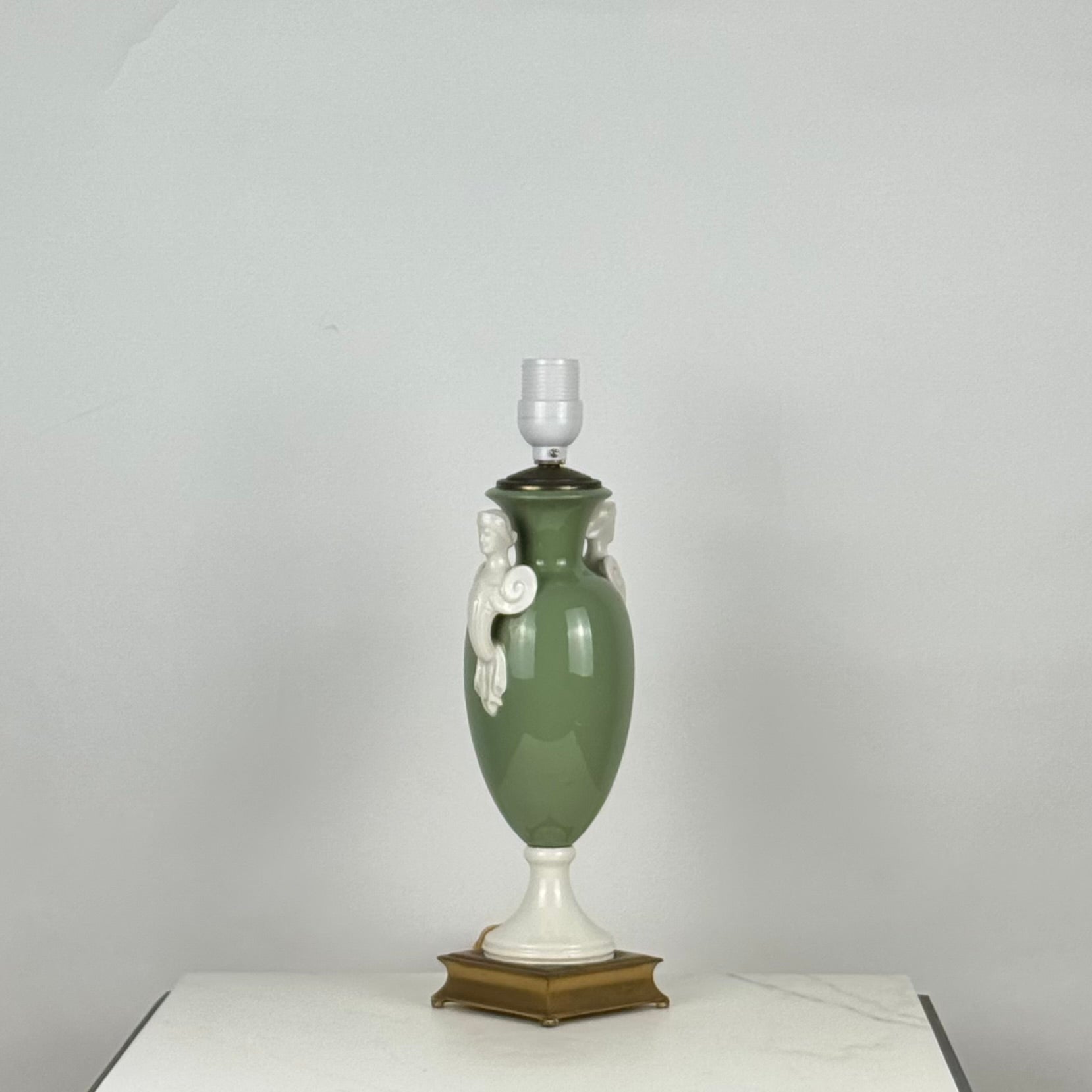 Elegant Lenox porcelain Neoclassical desk or table Lamp.
Custom parchment paper shade included.
The dimensions listed are of the lamp with the shade:
The base is 4 in. wide x 4 in. deep x 13 in. tall
The shade is 8 in. top diameter / 10 in. bottom