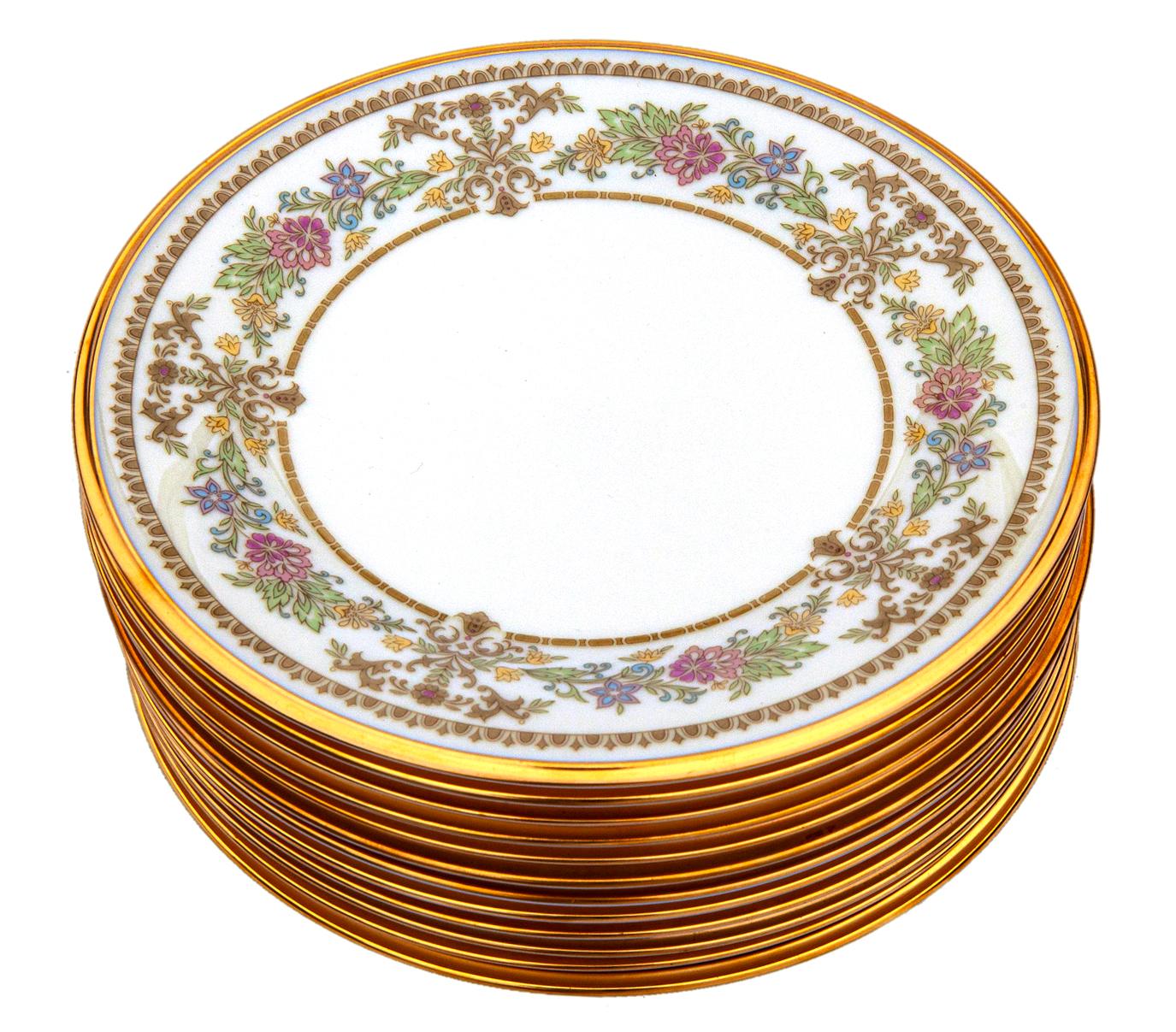 Classic Lenox China pattern “castle garden” from the 1970's in shades of pink, yellow, green on ivory background. 
This stunning pattern has since been discontinued by Lenox.
Gold band border on the rim. Just stunning. In perfect condition. 
