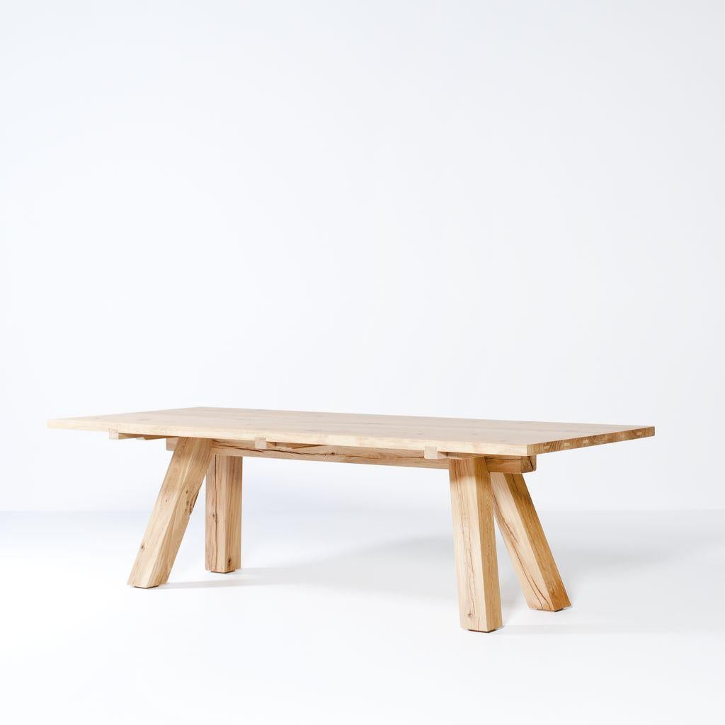 Lens dining table by Van Rossum
Dimensions: D220 x W100 x H75 cm
Materials: Oak.

The wood is available in all standard Van Rossum colors, or in a matching finish to customer’s own sample.

A hearty studio, dining, or co-working table in solid