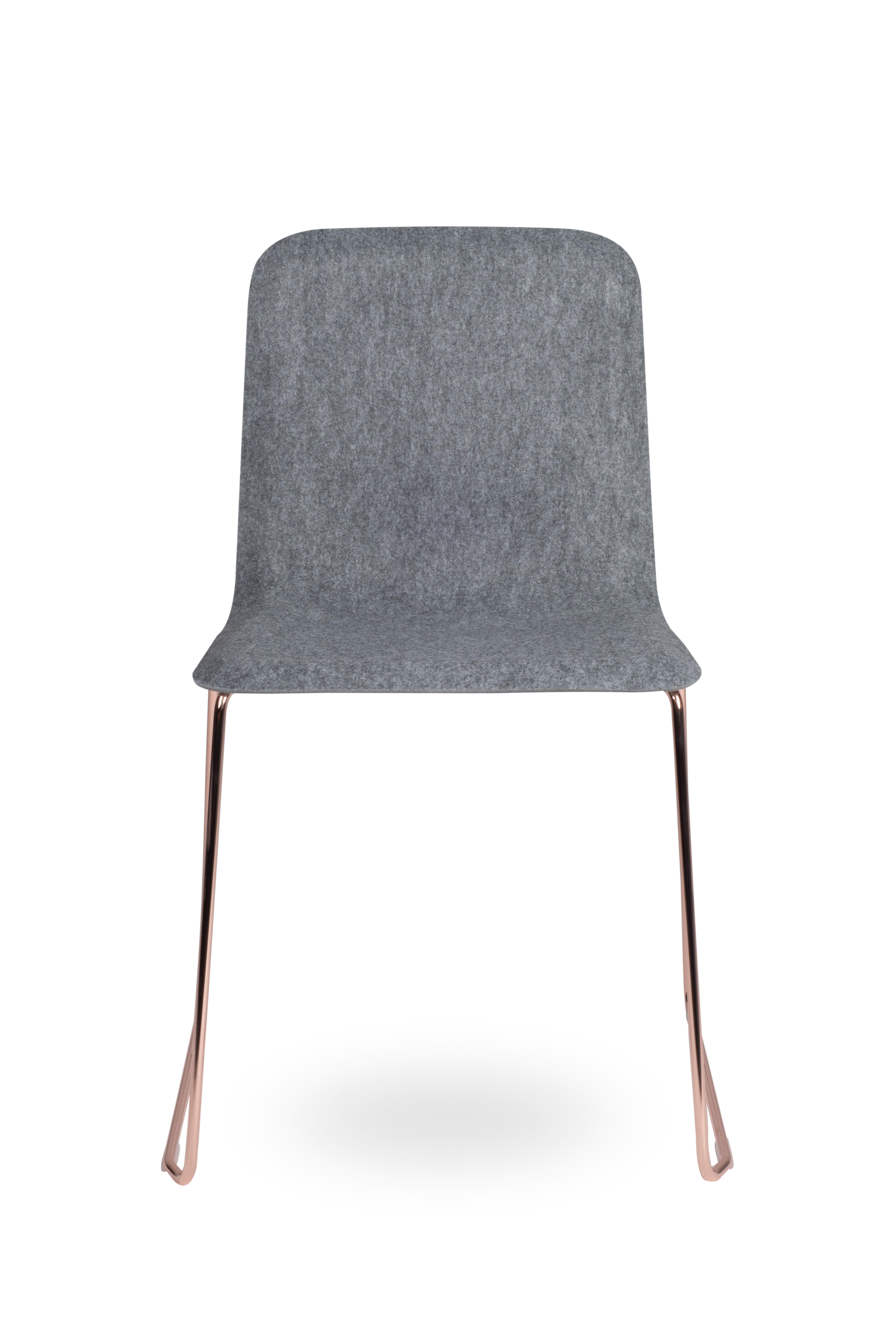 This chair 

The This chair has a 5 mm thick seat and a thin chrome metal wire base. It only weighs 1.7 kg because of the minimalistic use of material. Furthermore, This chair is quick and easy to connect and can be stacked in large quantities.