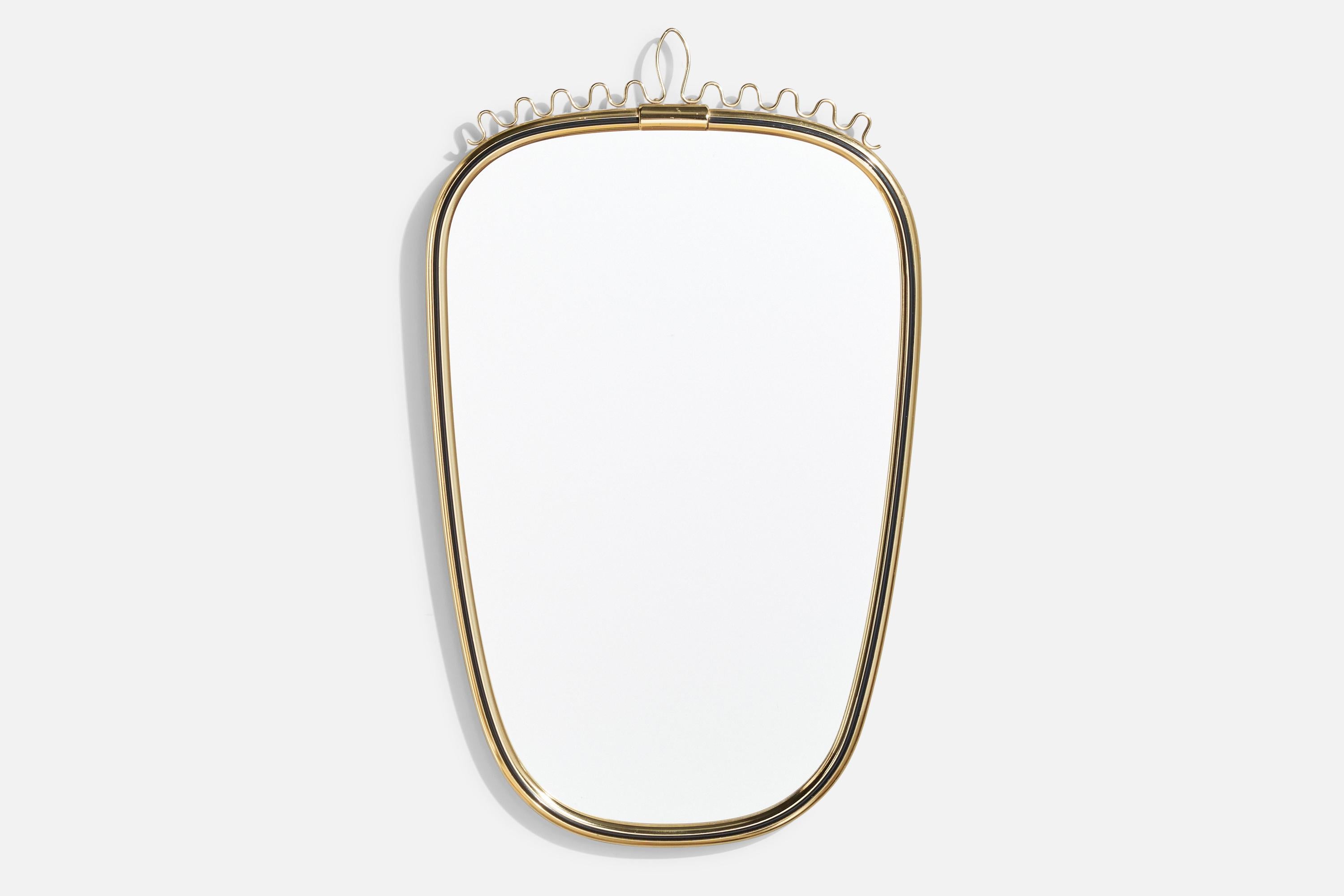 A brass wall mirror produced by Lenzgold, Germany, c. 1950s.

