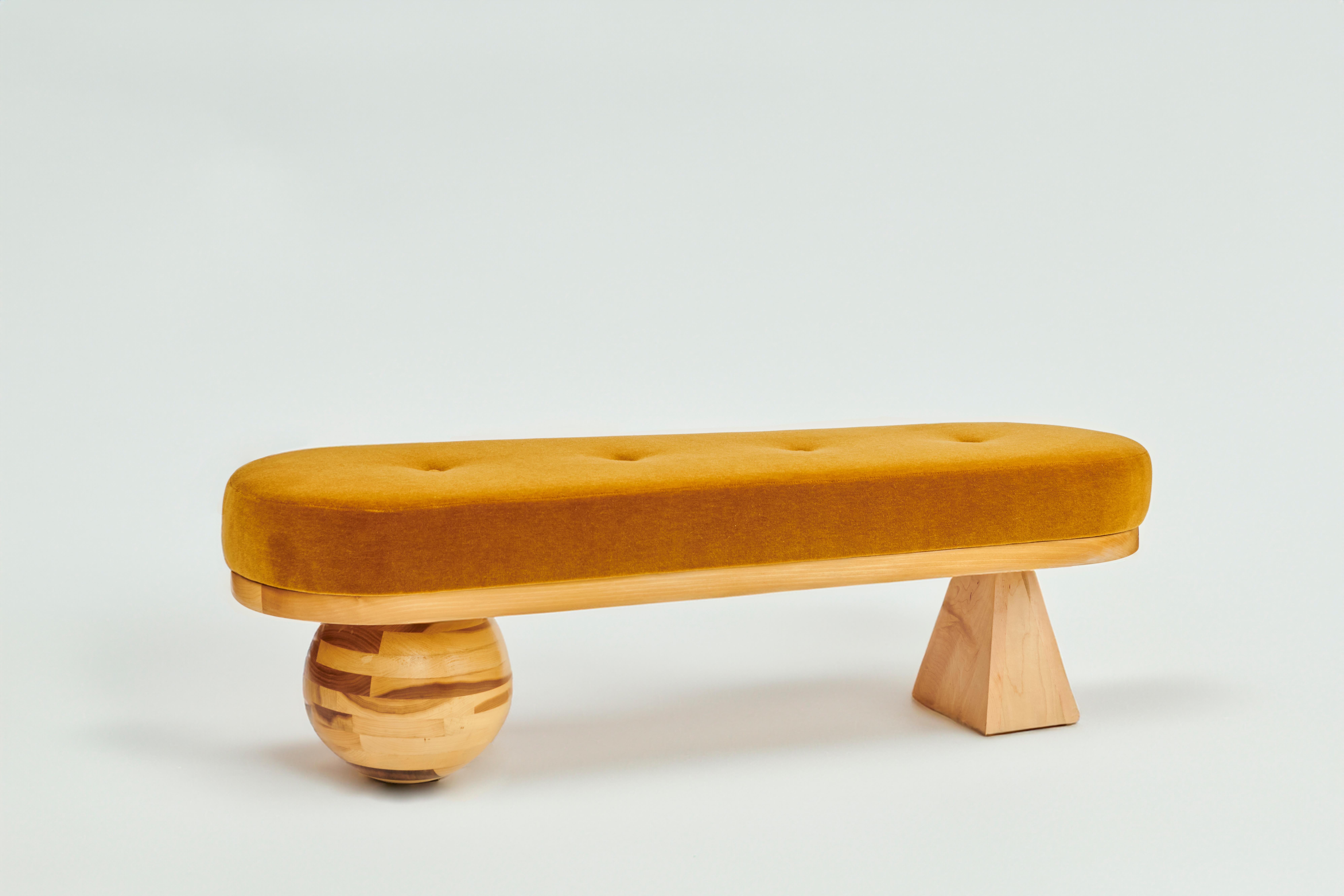 Made to order mohair and maple bench designed by Christian Siriano.

Fabric: Camel Mohair  (available in custom fabric)

Base: Natural Maple (available in custom finish)

Dimensions: 
Overall Width: 58” 
Overall Depth: 18” 
Overall Height: 19”
Base