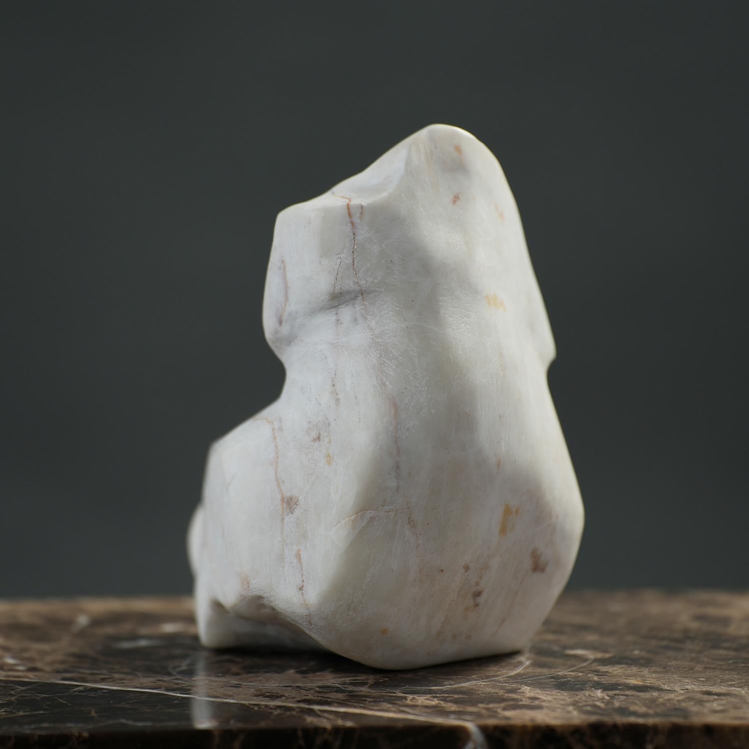 Abstract Form is a mid-century modern sculpture by Dutch artist Leo De Beer, exemplifying his commitment to uncovering form from within. Rendered in a stylized and abstract manner characteristic of the era, the piece is carved from stone, lending it