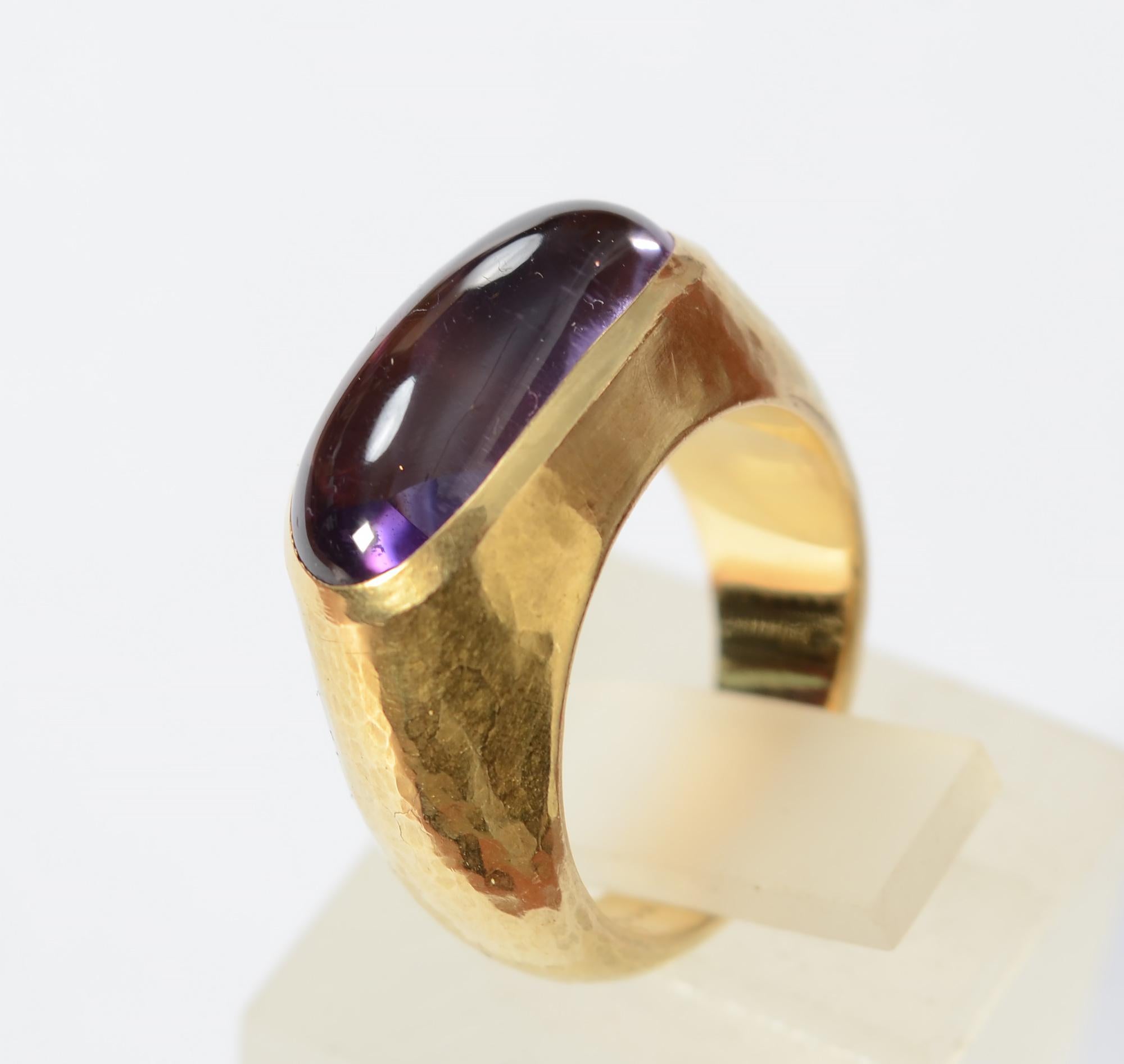 Lovely amethyst ring by London designer, Leo De Vroomen. The 18 karat gold has a lightly hand hammered finish. The amethyst measures 3/4