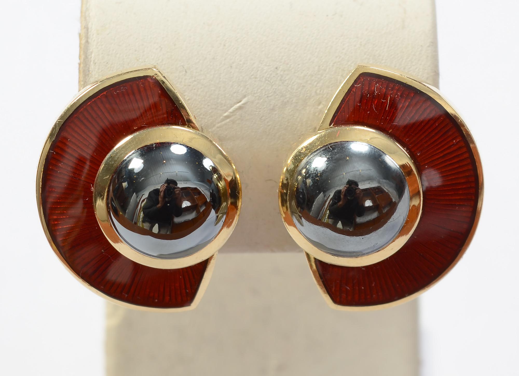 Richly colored enamel and hematite earrings by London jeweler, Leo De Vroomen. The red seen in the overall photos is a more accurate representation of the color than seen in the thumbnails. The red varies depending tremendously upon the light in