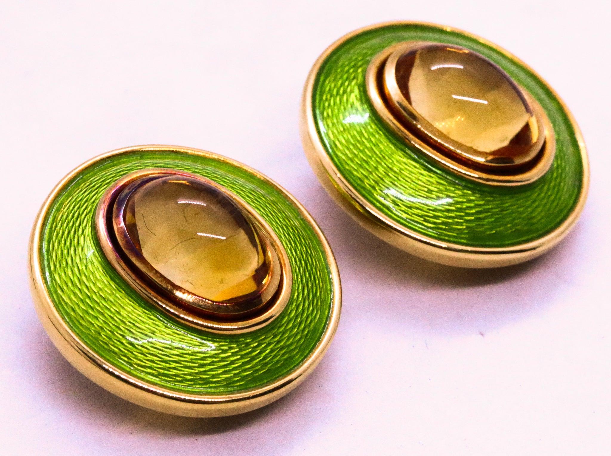 Pair of gem set clips-earrings designed by Leo De Vroomen.

This is a beautiful and colorful pair of clips-on earrings, created in London United Kingdom by the jewelry house of Leo De Vroomen, back in the 1998. The pair of clips-earrings was