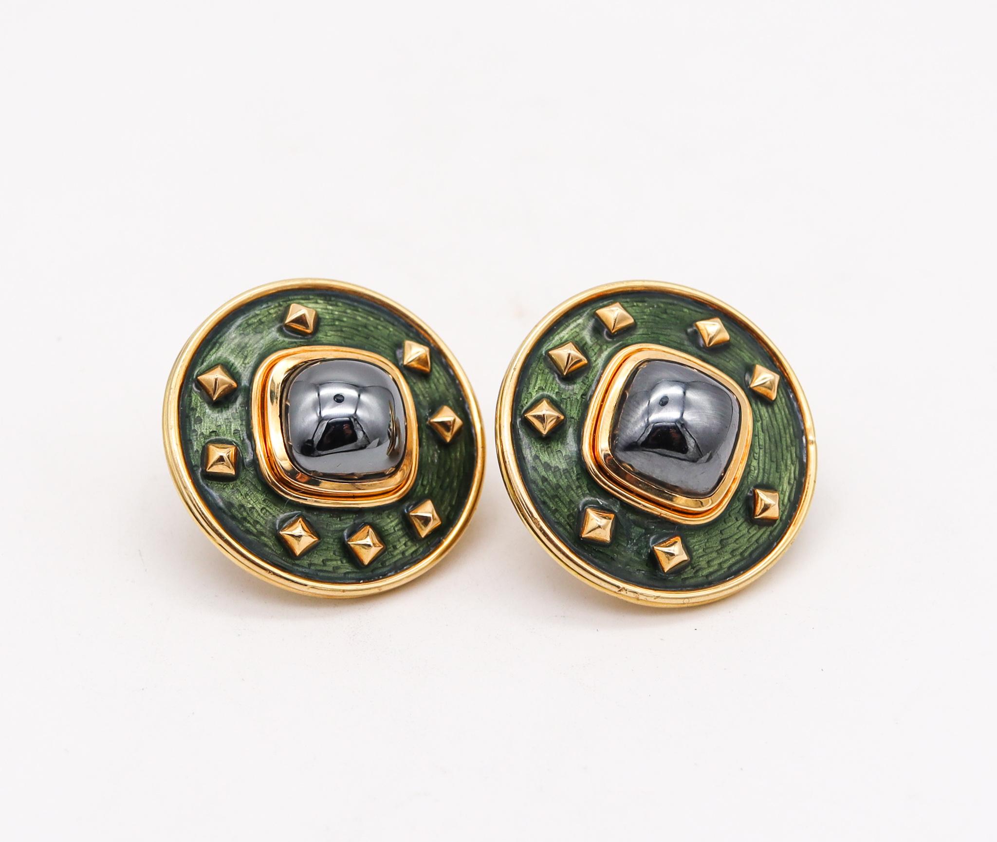 Pair of clips-earrings designed by Leo De Vroomen.

Beautiful and colorful statement geometric round earrings, created in London United Kingdom by the jewelry house of Leo De Vroomen, back in the 1990. This pair of earrings was carefully crafted in