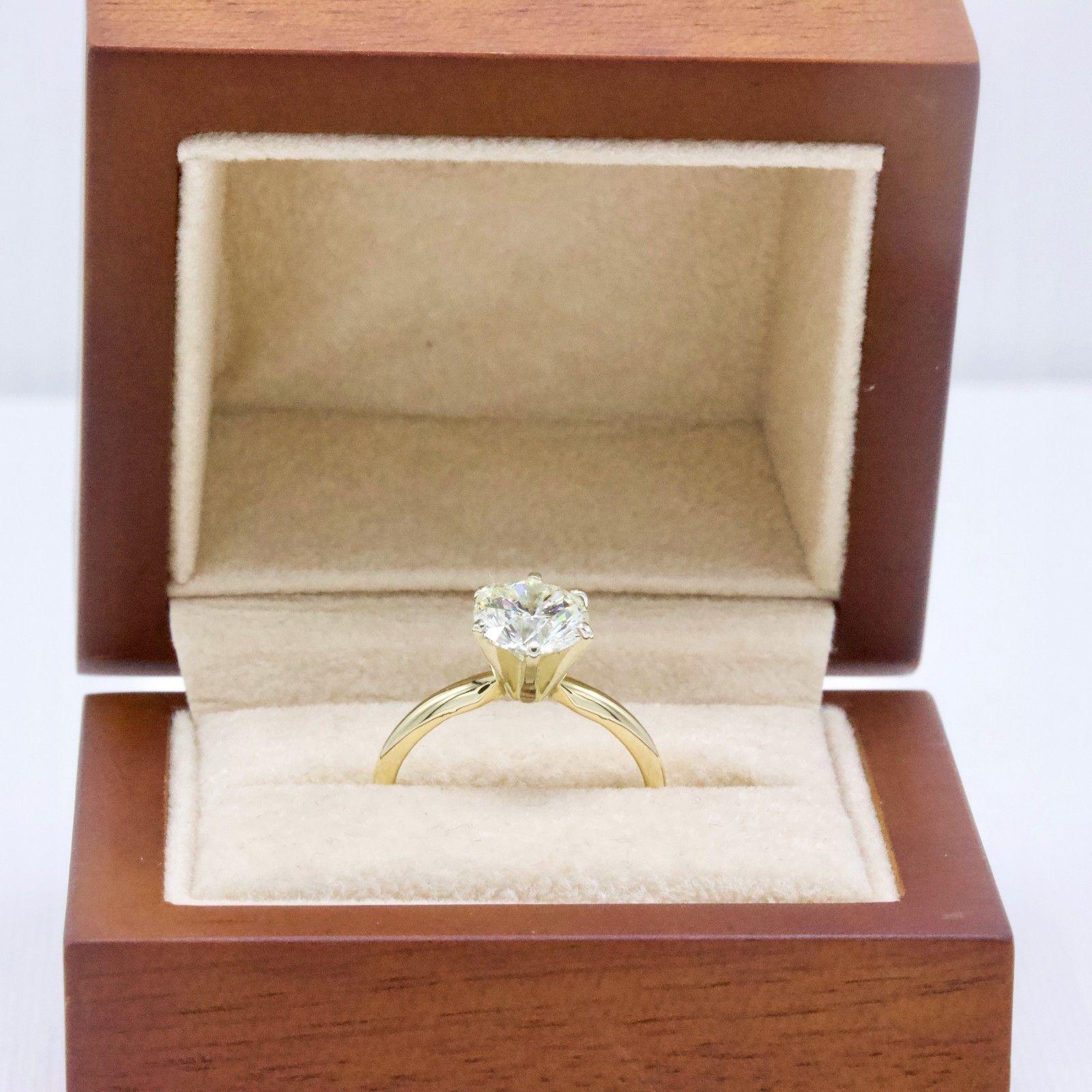 The Leo Diamond by Leo Schachter

Style:  Solitaire Engagement Ring
Serial Number:  LEO-207797
Certificate:  IGI #3229506U
Metal:  14K Yellow Gold
Size:   5.5 - sizable
Total Carat Weight:  1.57 CTS
Diamond Shape:  Leo Round 
Diamond Color &