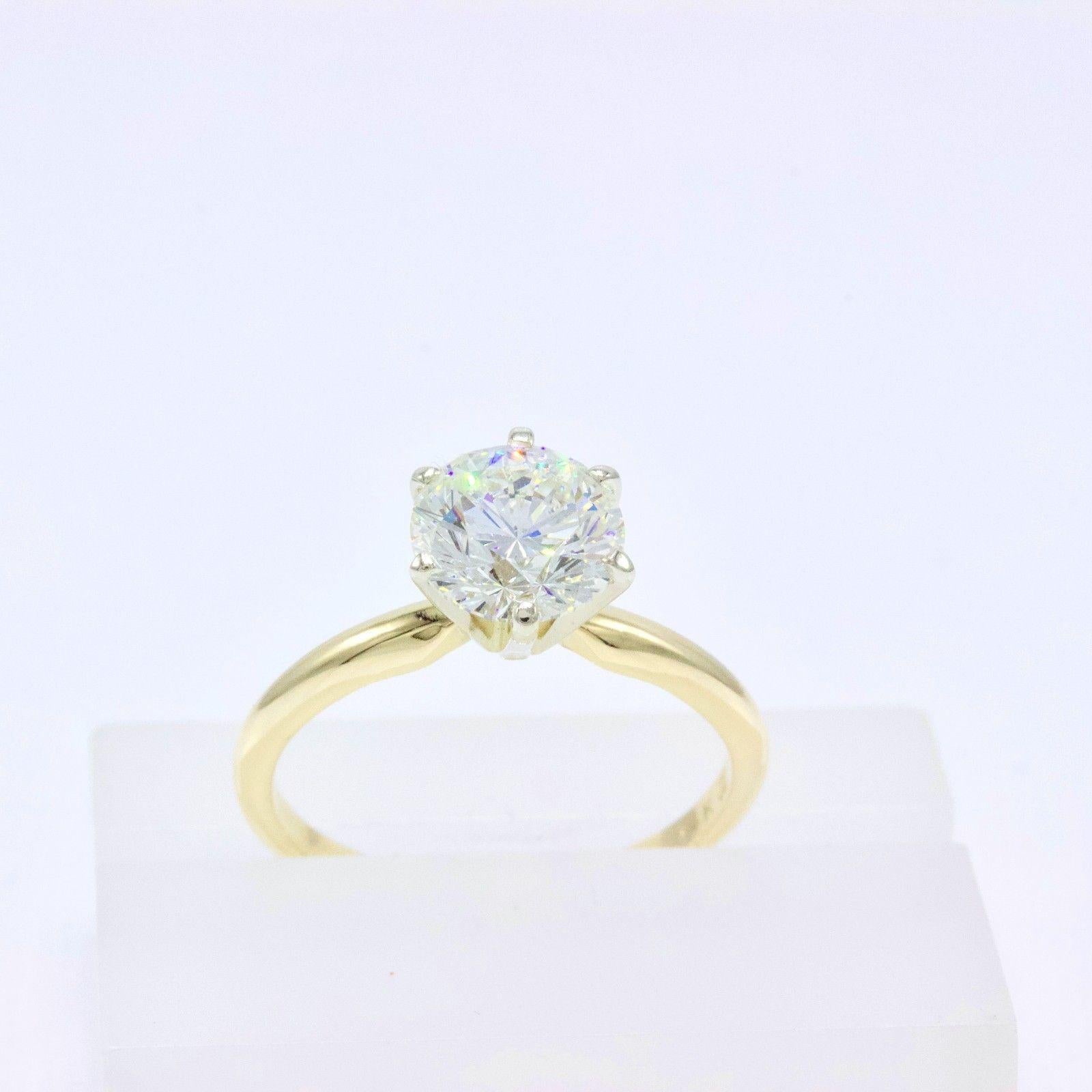 Round Cut Leo Diamond Engagement Ring Round 1.57 Carat I VS2 in 14 Karat Gold IGI Report For Sale