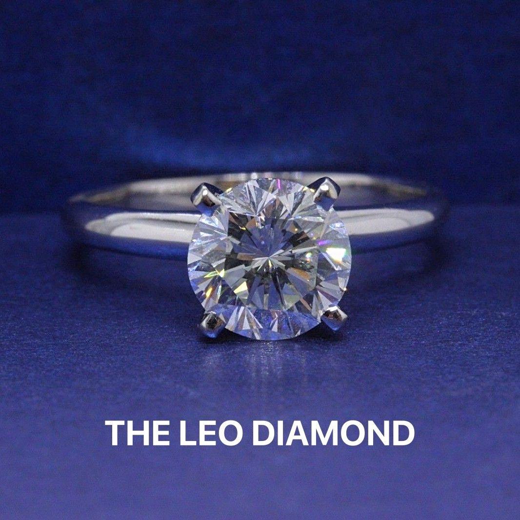 THE LEO DIAMOND ENGAGEMENT RING

Style:  4-Prong Solitaire Engagement Ring
Serial Number:  LEO 182935
Certificate:  IGI # 7007308U
Metal: 14KT White Gold 
Size:  7.0 - Sizable 
Total Carat Weight:  1.97 CTS
Diamond Shape:  Leo Round 
Diamond Color &