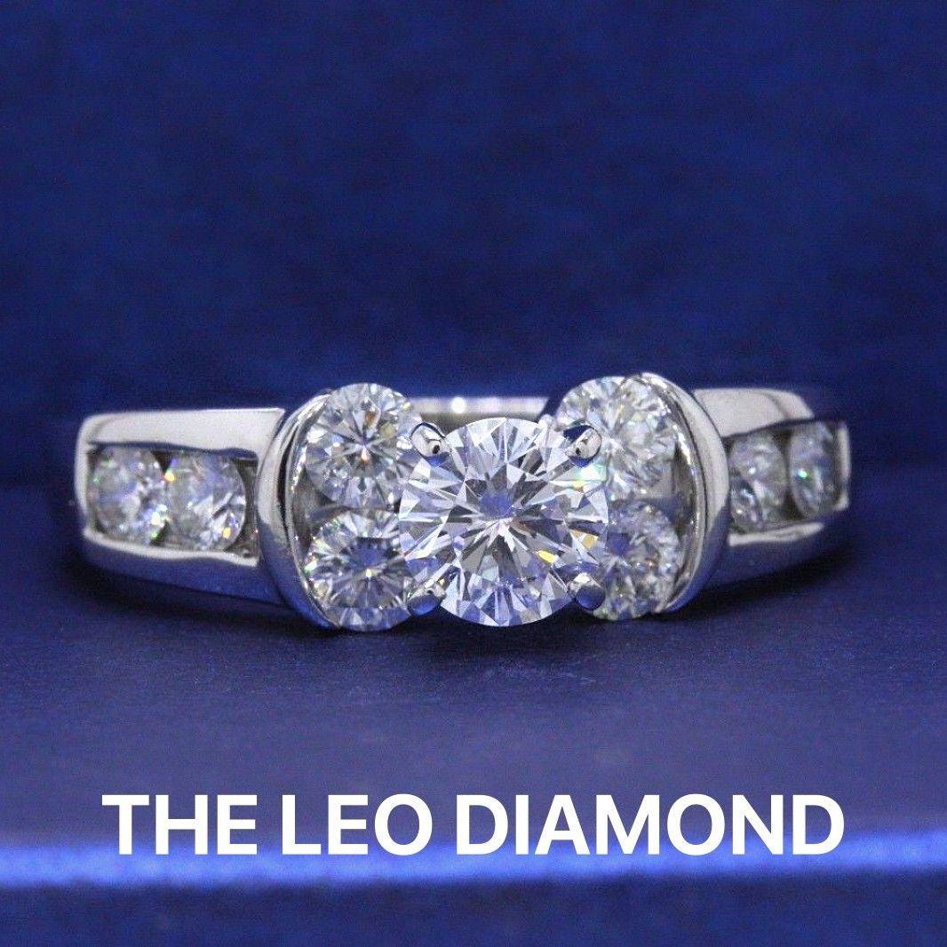LE DIAMANT LEO 
Le style :  LEO Bridal Solitaire avec pierres latérales et anneau Channel Set Design
Numéro de série :  LEO 720955
Certificat :  IGI # 32671691
Métal : or blanc 14KT et pinces en platine
Taille :  6.75 - Sensible
Poids total en