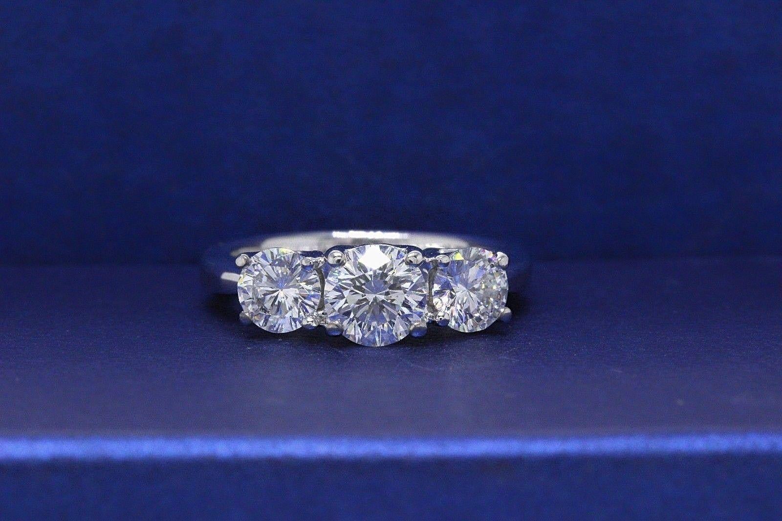 leo 3 stone diamond ring