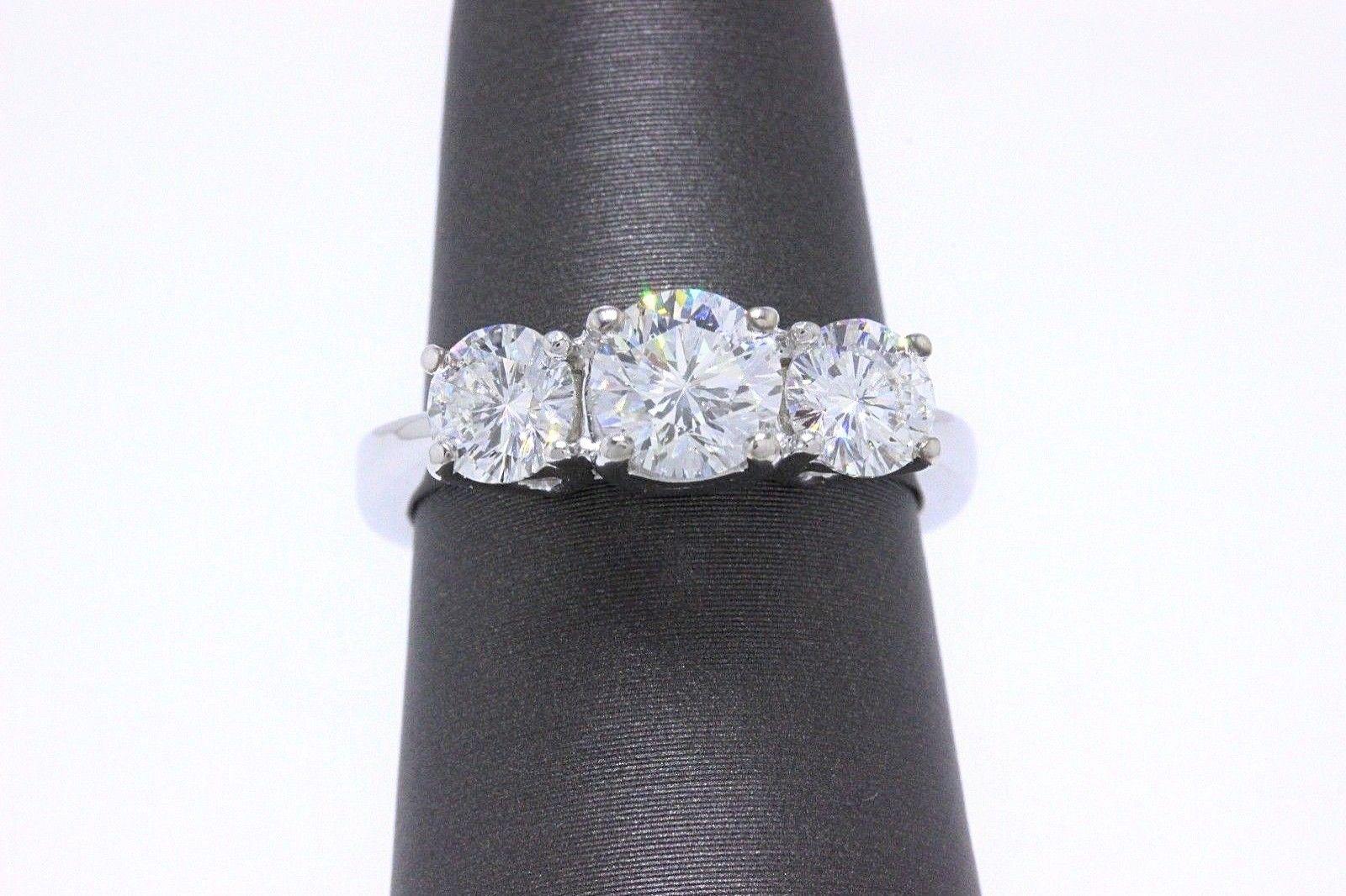 3 stone leo diamond ring