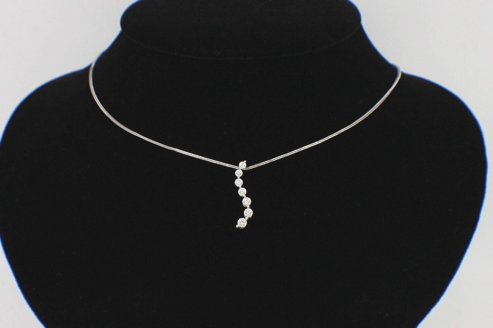 Leo Diamond Journey Necklace Pendant 0.61 Carat Set in 14 Karat White Gold For Sale 2