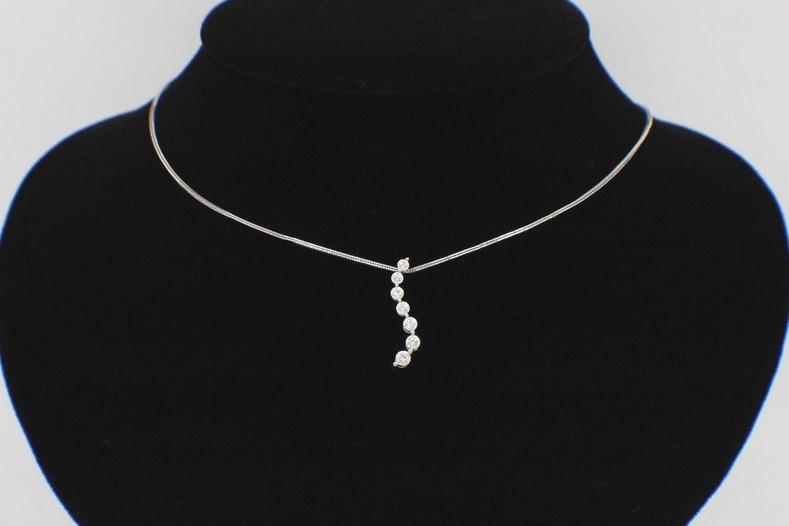 Round Cut Leo Diamond Journey Necklace Pendant 0.61 Carat Set in 14 Karat White Gold For Sale