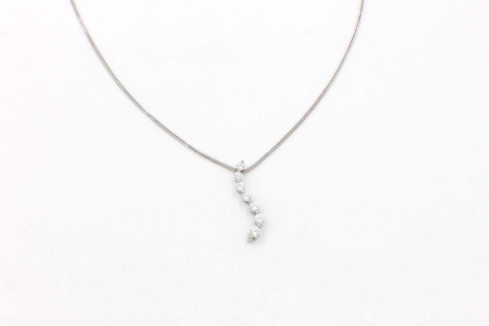 Women's Leo Diamond Journey Necklace Pendant 0.61 Carat Set in 14 Karat White Gold For Sale