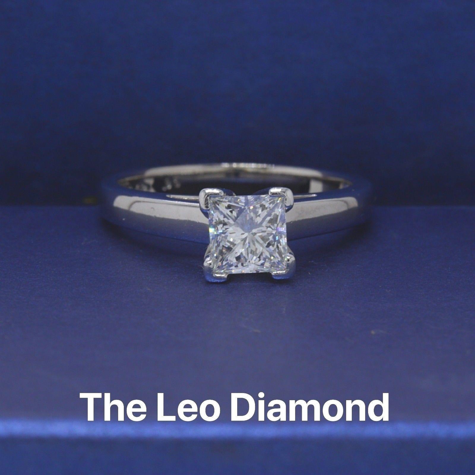 LEO DIAMOND
Style: Solitaire
Serial Number: LEO 2008450S
Metal: 14KT White Gold
Size:  6.75 (sizable)
Total Carat Weight:  0.95CTS
Diamond Shape: LEO Princess
Diamond Color & Clarity: H / SI1
Comments: Diamond is Laser Inscribed 