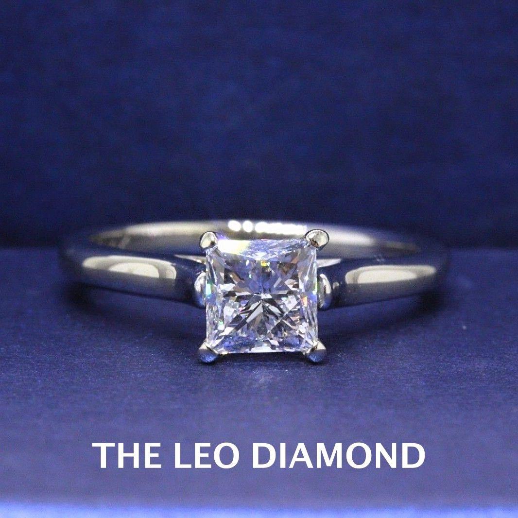 THE LEO DIAMOND ENGAGEMENT RING
Style:  4-Prong Solitaire Engagement Ring
Serial Number:  LEO 2031725S
Certificate:  GSI # 9455800107
Metal: 14KT White Gold
Size:  5.5 - Sizable 
Total Carat Weight:  1.00 CTS
Diamond Shape:  Leo Princess
Diamond