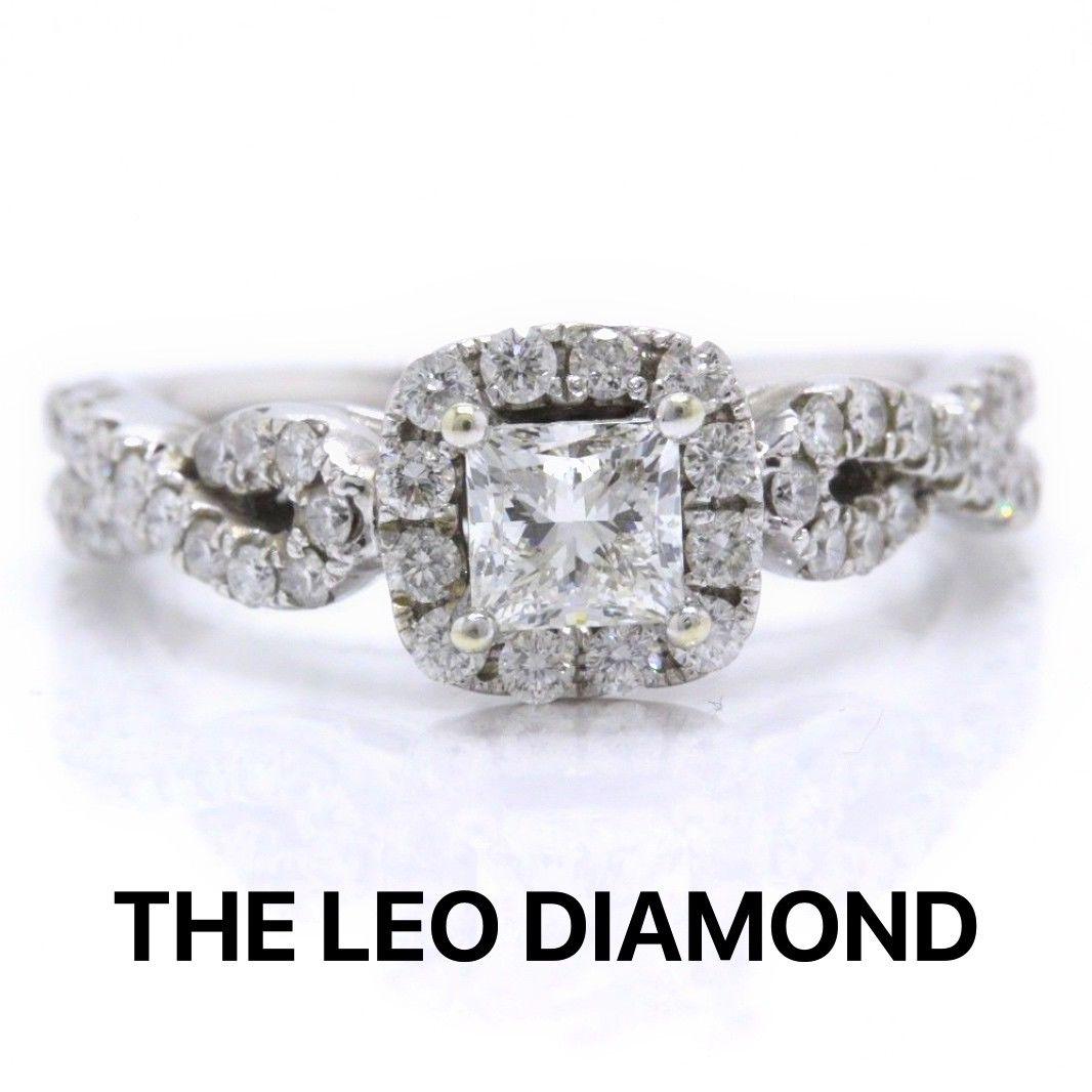 THE LEO DIAMOND BRIDAL
Style: Halo with Twist Diamond Band
Serial Number: LEO 5095320S
Metal: 14KT White Gold
Size:  6 - sizable
Total Carat Weight: 1.08 TCW
Center Stone Weight: 0.54 CT
Center Diamond Shape: LEO Princess Cut Diamond
Diamond Color &