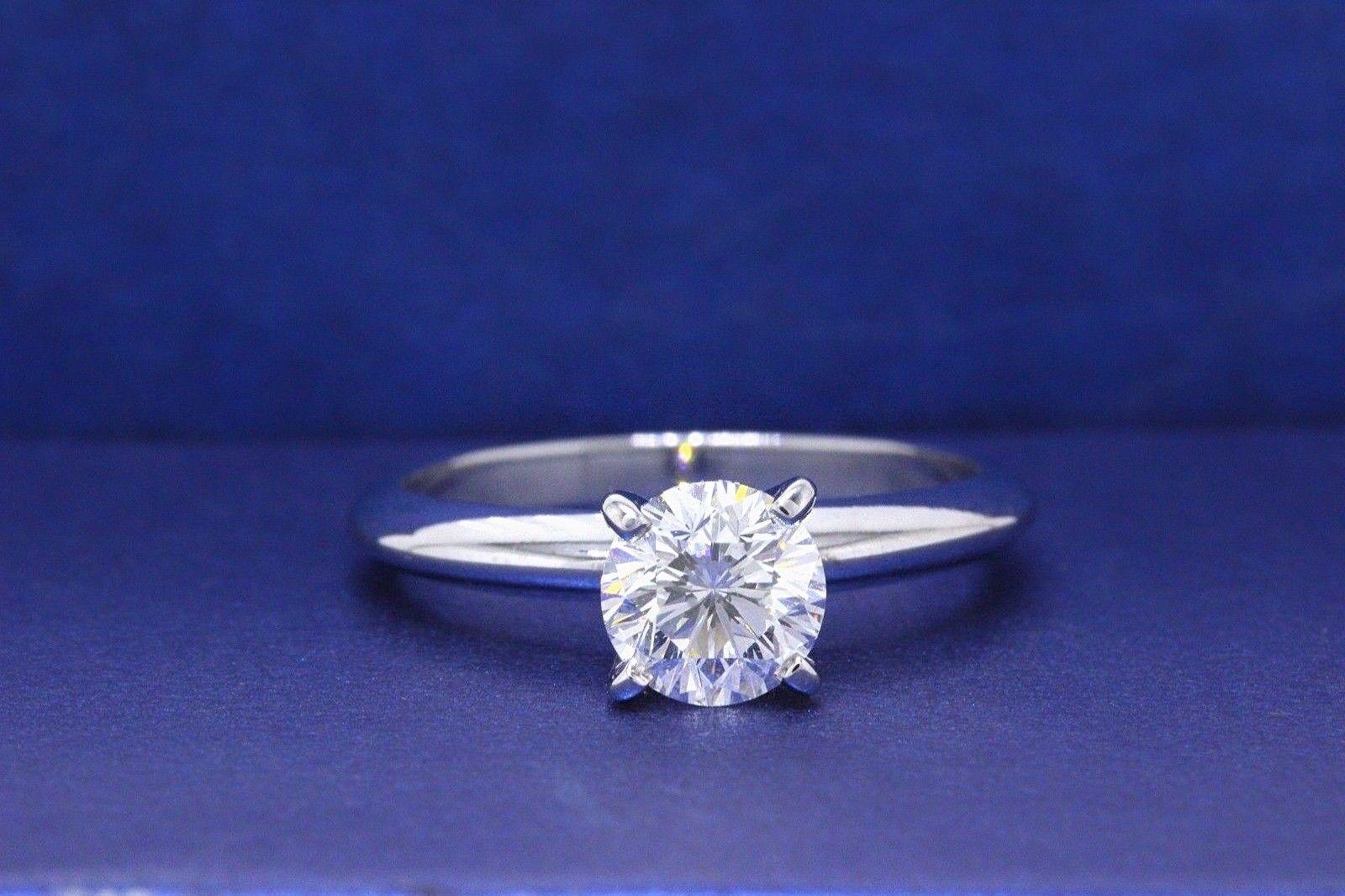 Round Cut Leo Diamond Solitaire Engagement Ring Round 0.99 Carat H SI1 14 Karat White Gold For Sale