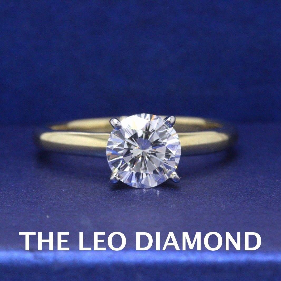 THE LEO DIAMOND SOLITAIRE ENGAGEMENT RING
Style:  4 - Prong Solitaire
Serial Number:  LEO 033759
Certificate:  IGI # 31200657
Metal: 14KT Yellow Gold
Size:  5.5 - Sizable 
Total Carat Weight:  0.99 CTS
Diamond Shape:  Leo Round
Diamond Color &