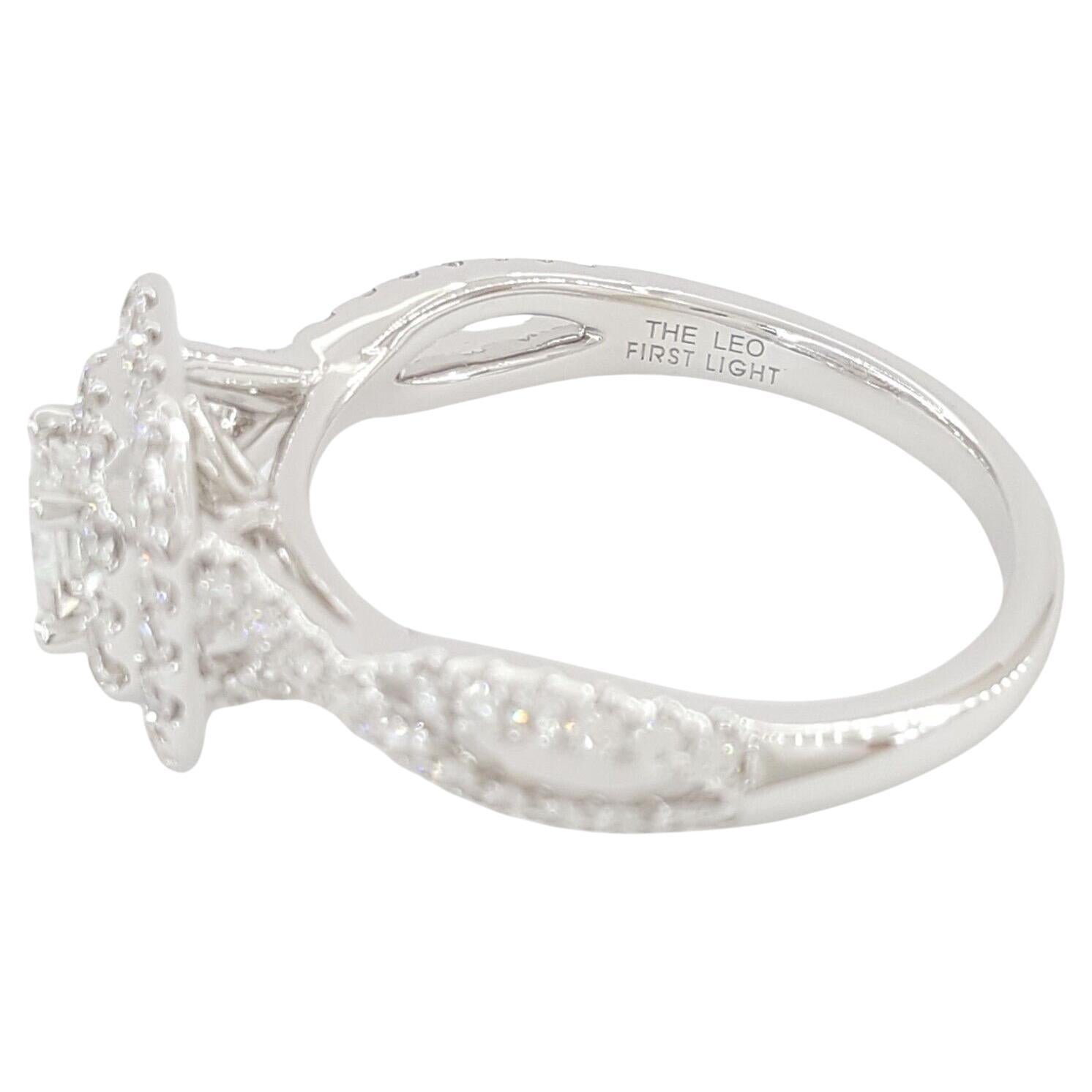  Leo First Light Diamond Engagement Ring, an exquisite symbol of love and commitment.

Crafted in luxurious 14k white gold, this enchanting ring boasts a total weight of 7/8 carats, promising timeless elegance and sophistication. Weighing 4.7 grams