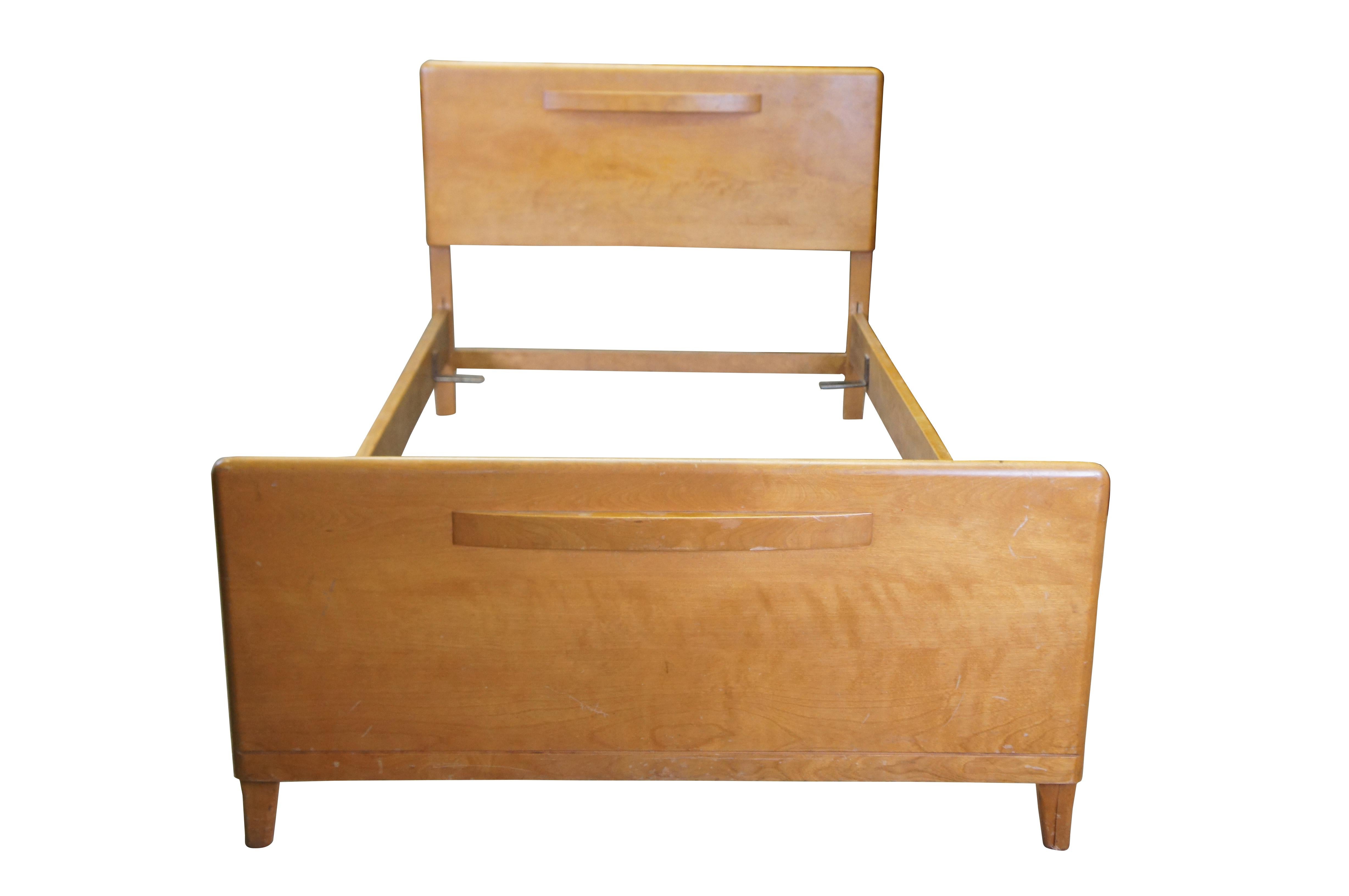 Mid century modern Leo Jiranek for Heywood Wakefield twin size bed frame.  Made of maple (champagne).  Rockefeller Center. CA 740.

LEO A. JIRANEK
Leo Jiranek (b.1900 d.1990) was known as the ''Dean of Furniture Designers,