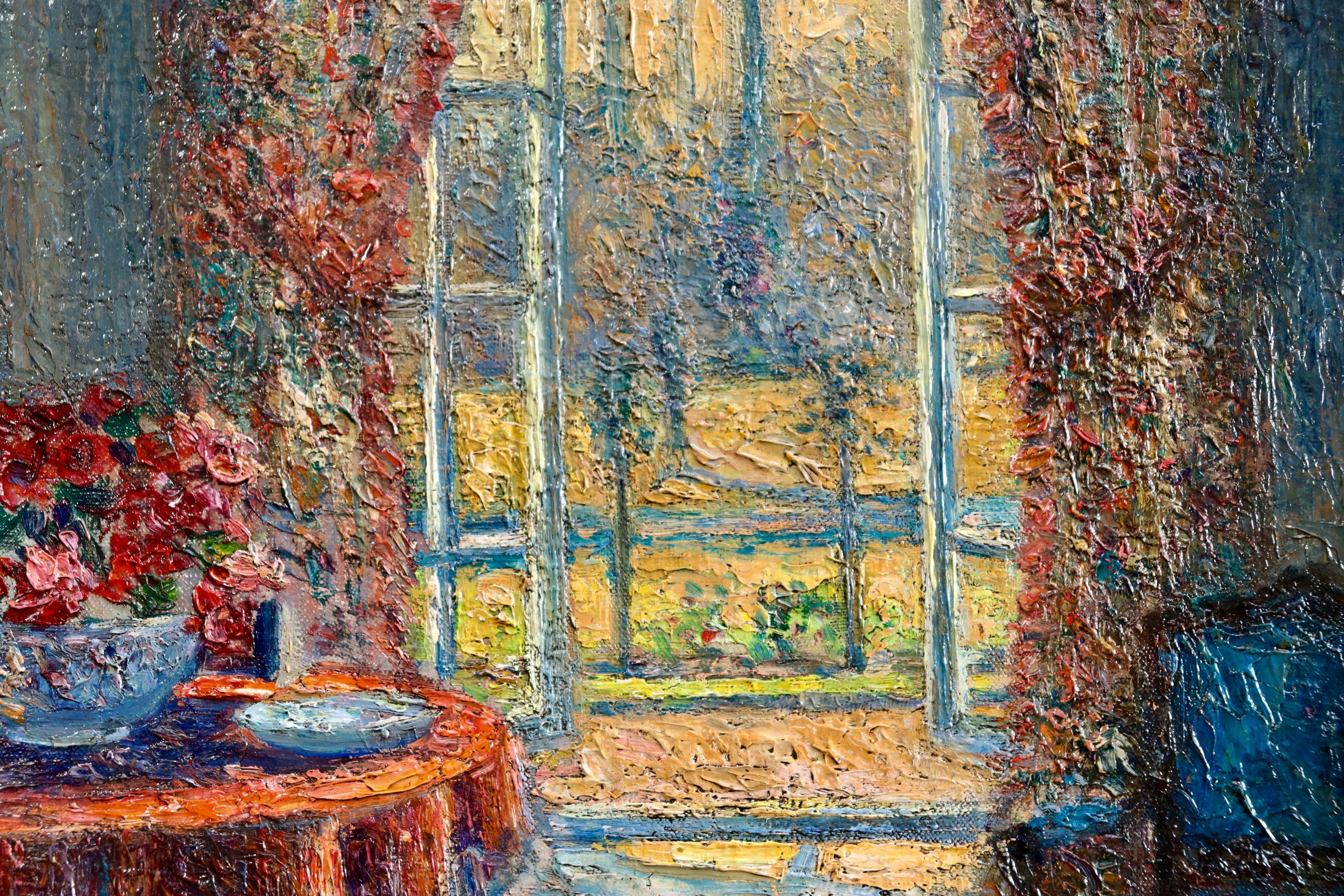 A wonderful oil on canvas circa 1900 by French painter Leo Gausson depicting a view of the inside of the artist's house and a view of the gardens beyond from the open windows. Signed lower right. Framed dimensions are 26 inches high by 22 inches