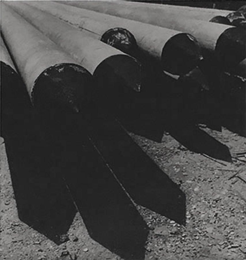 Pipes. Abstract black and white vintage photograph. (Framed) - Photograph by Leo Matiz