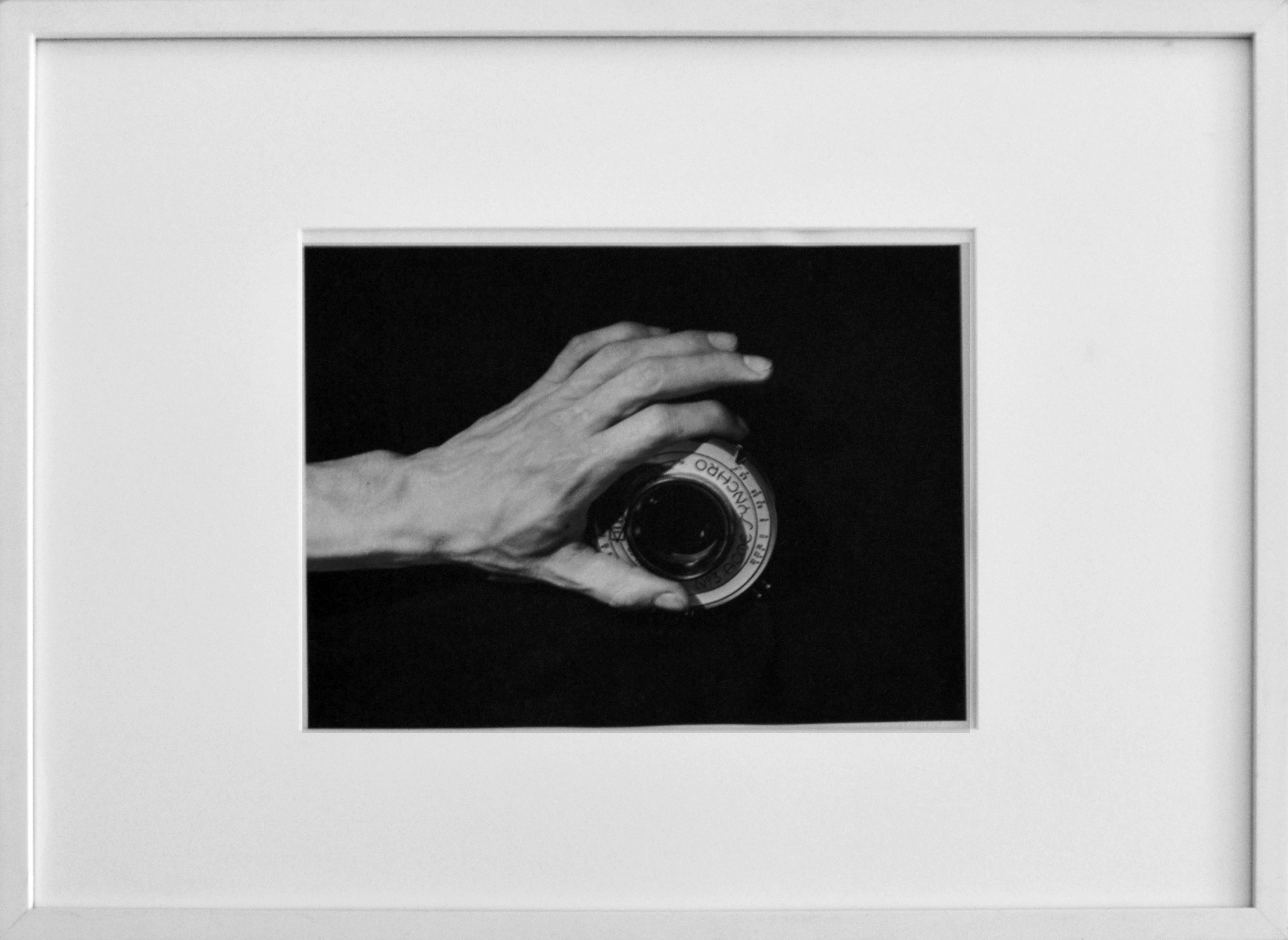 Hand on the Camera, Mexico. Figurative black and white photograph. Framed - Black Black and White Photograph by Leo Matiz