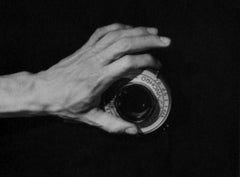 Hand on the Camera, Mexico. Figurative black and white photograph. Framed