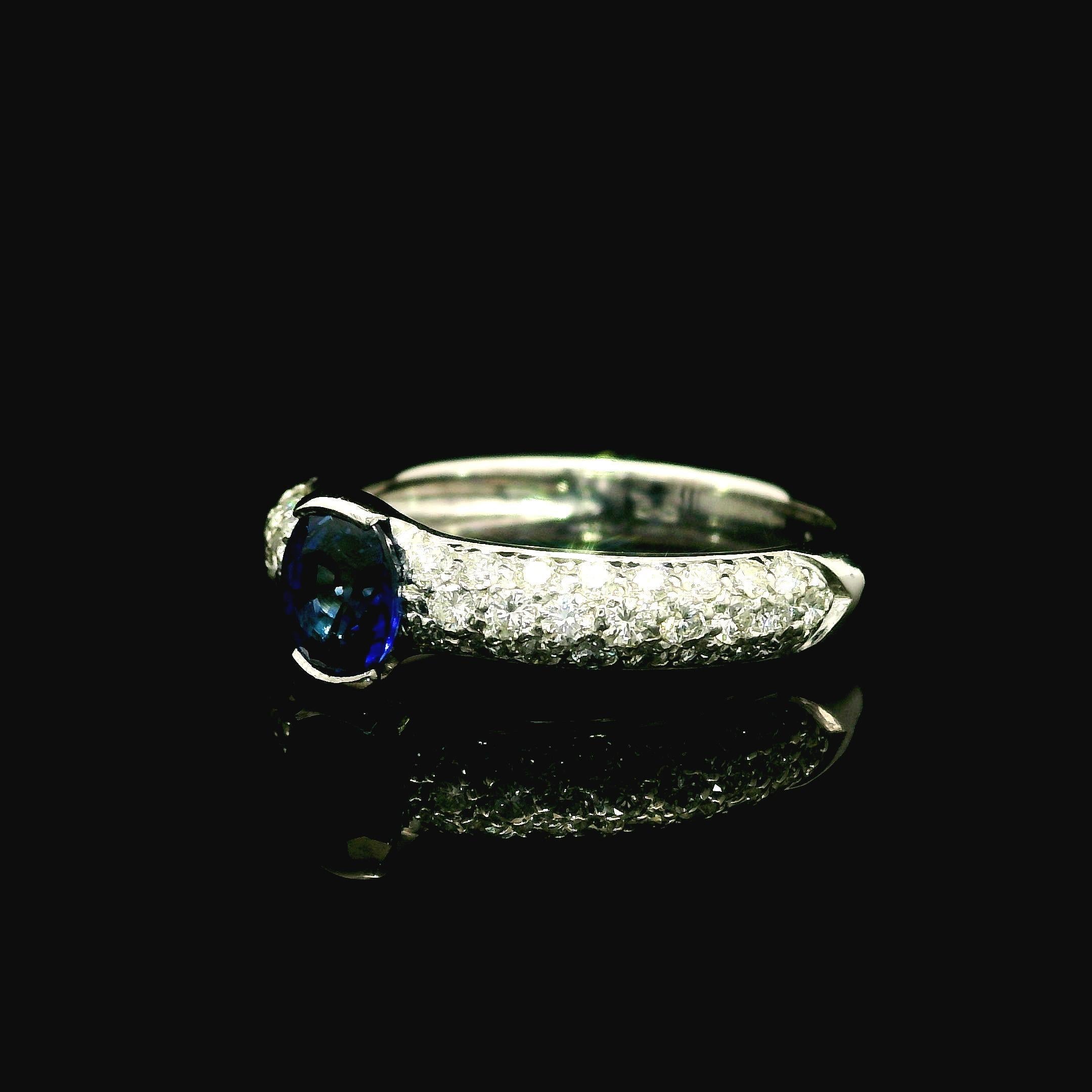 --Stone(s):--
(1) Natural Genuine Sapphire - Oval Cut - Half Bezel / Channel Set - True Clean Royal Blue Color - 0.91ct (exact)
(48) Natural Genuine Diamonds - Round Brilliant Cut - Pave Set - Gorgeous White Color - 0.60ctw (Approx.)
Total Carat
