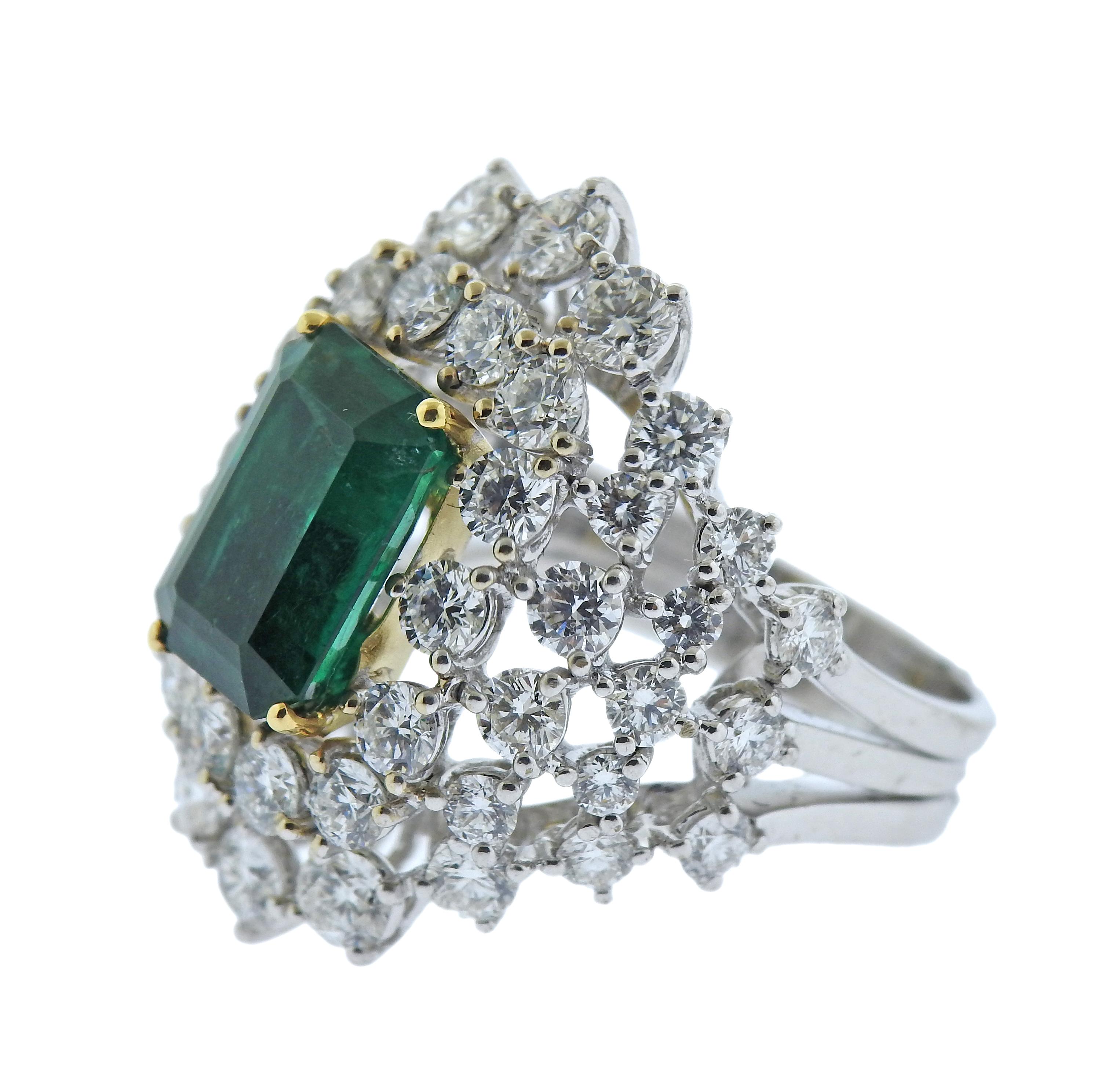 Impressive 18k gold cocktail ring by Leo Pizzo, set with center emerald  cut approx. 3.94ct emerald ( stone measuring 11.8 x 8.4 x 5.4mm with a tiny chip on the girdle). surrounded with approx. 3.72ctw in diamonds. Ring size - 7.25, ring top - 26mm