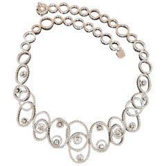 Halskette mit ovalem Wirbel, 6,18 Karat abgestufter Diamanten von Leo Pizzo