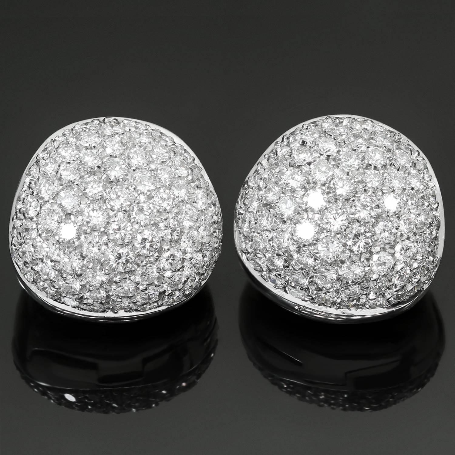 These chic Leo Pizzo huggie earrings are crafted in 18k white gold and pave-set with brilliant-cut round diamonds of an estimated 3.0 carats. Made in Italy circa 2010s. Measurements: 0.55
