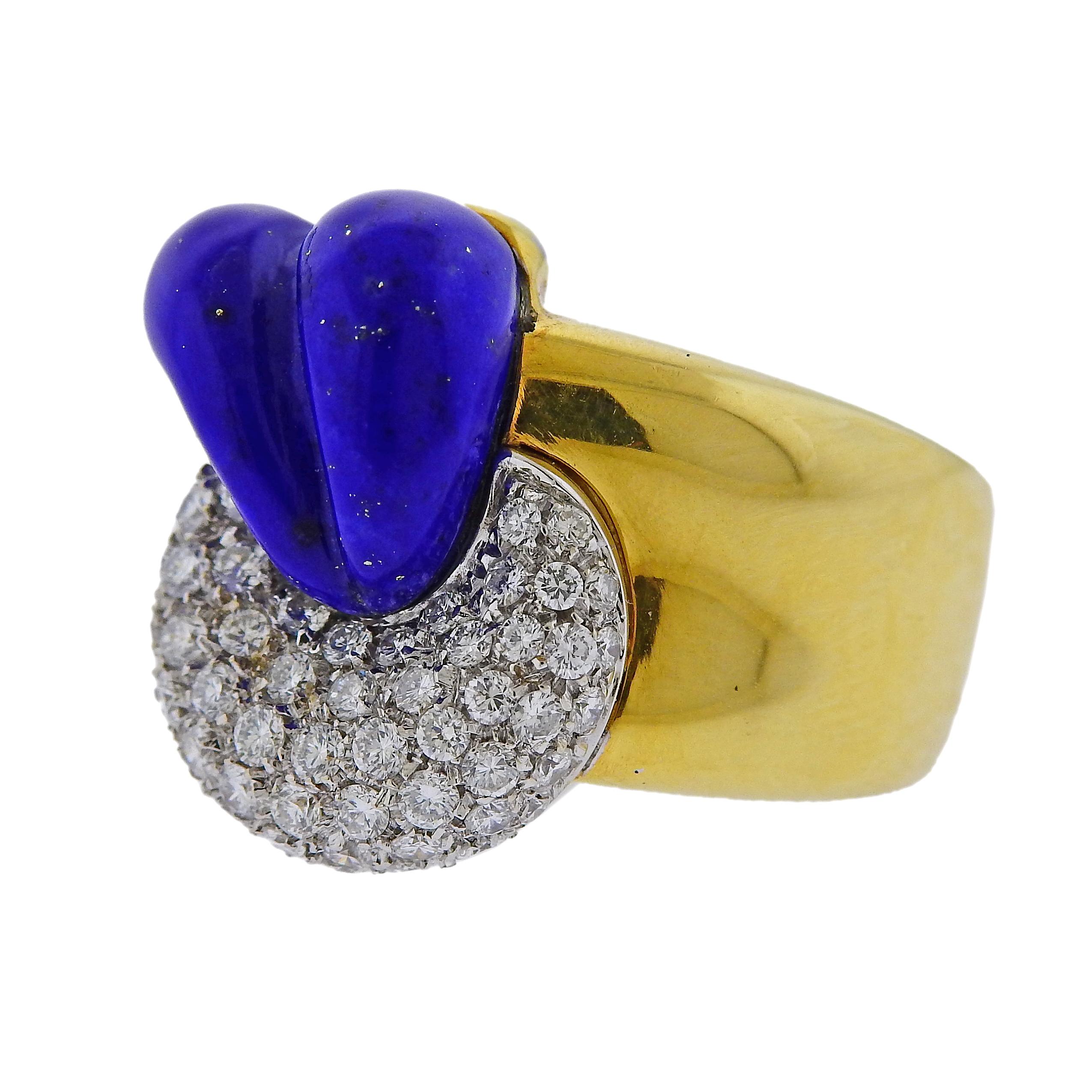 18k yellow gold ring by Leo Pizzo, adorned with carved lapis lazuli and approx. 0.85ctw in G/VS diamonds. Ring size - 7.5, ring top is 21mm wide and weighs 15.5 grams. Marked Italy, Leo Pizzo, 750, Italian mark. 