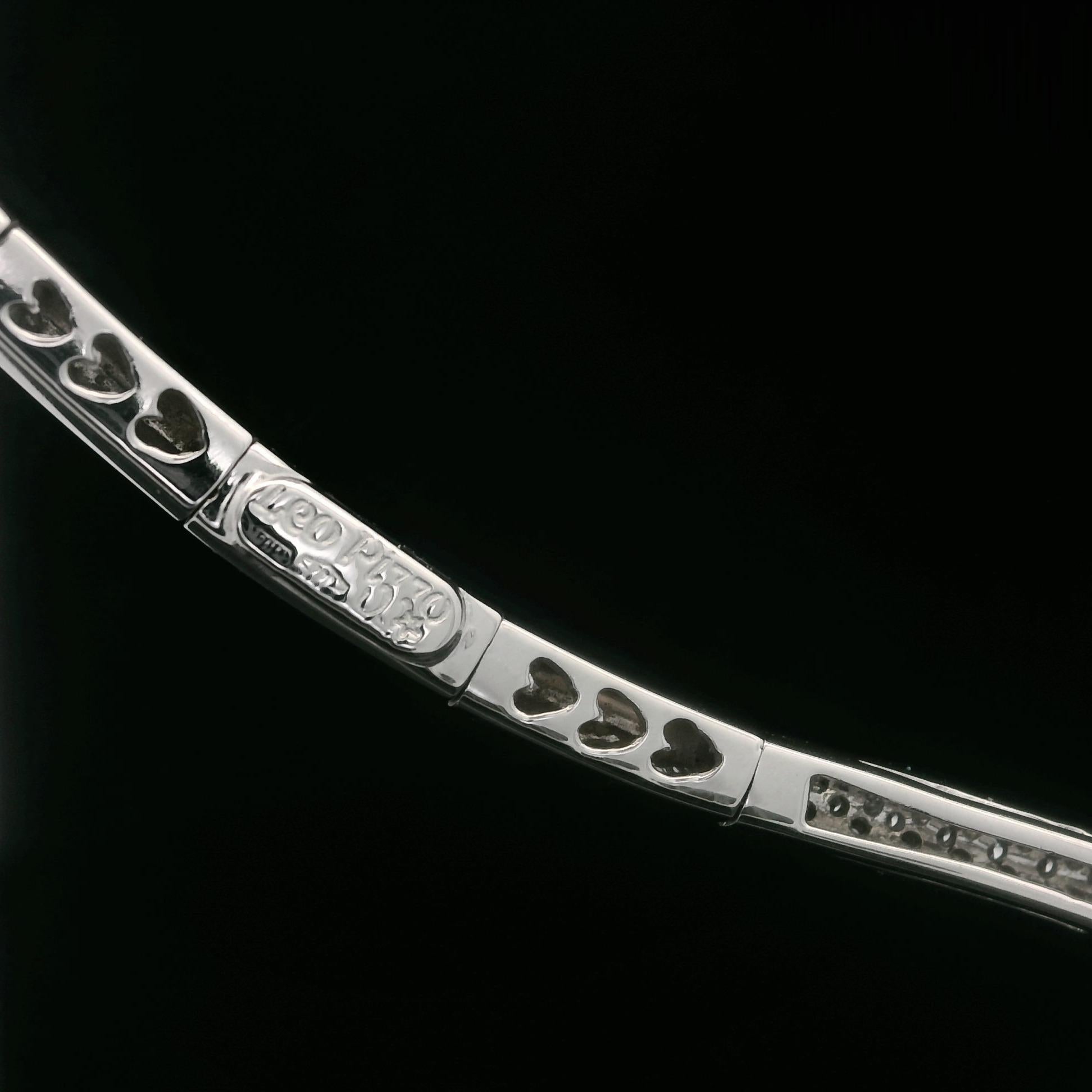 –Stone(s)–
Numerous Natural Genuine Diamonds - Round Brilliant Cut - Pave Set - G/H Color - VS-SI Clarity - 1.25ctw (approx.)

Material: Solid 18k White Gold
Weight: 35.05 Grams
Chain Type: 3.3mm - 16” - Polished Sectional link - Push Clasp w/