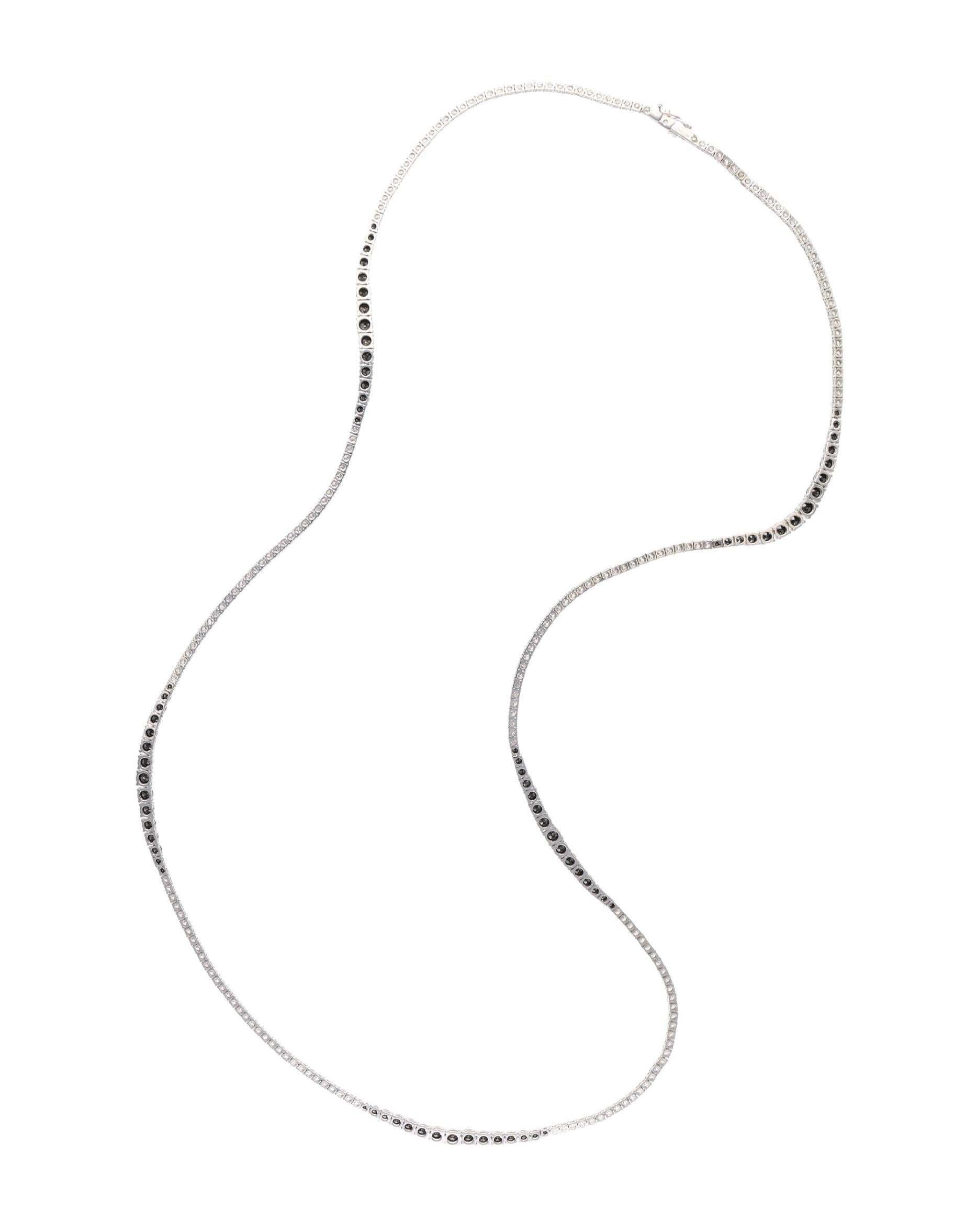 A simple yet stunning necklace composed of round brilliant cut black and colorless diamonds.

- Diamonds weigh a total of approximately 16.00 carats
- Signed Leo Pizzo
- Italy
- 18 karat white gold
- Total weight 32.58 grams
- Length 30 inches

The