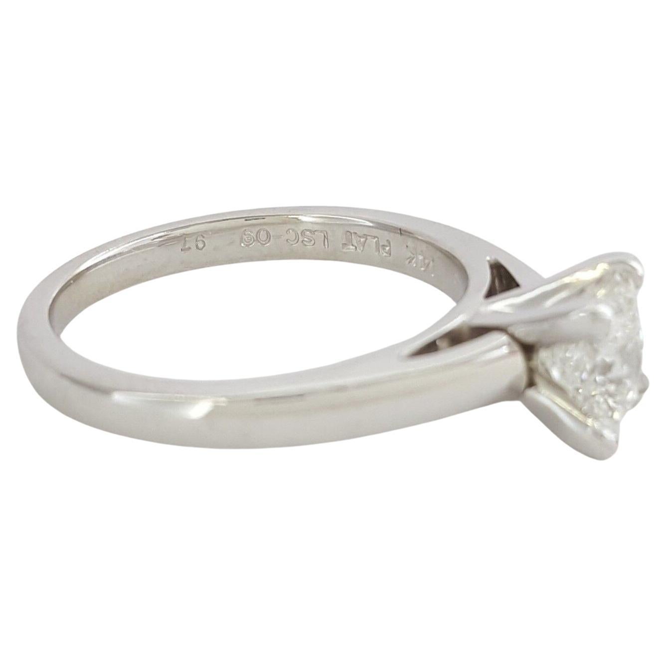A Leo Princess Brilliant Cut Diamond Solitaire Engagement Ring is crafted with a 14K White Gold shank and a 950 Platinum head. Weighing 4.5 grams and sized 7, the ring features a central Natural Leo Princess Brilliant Cut diamond, with