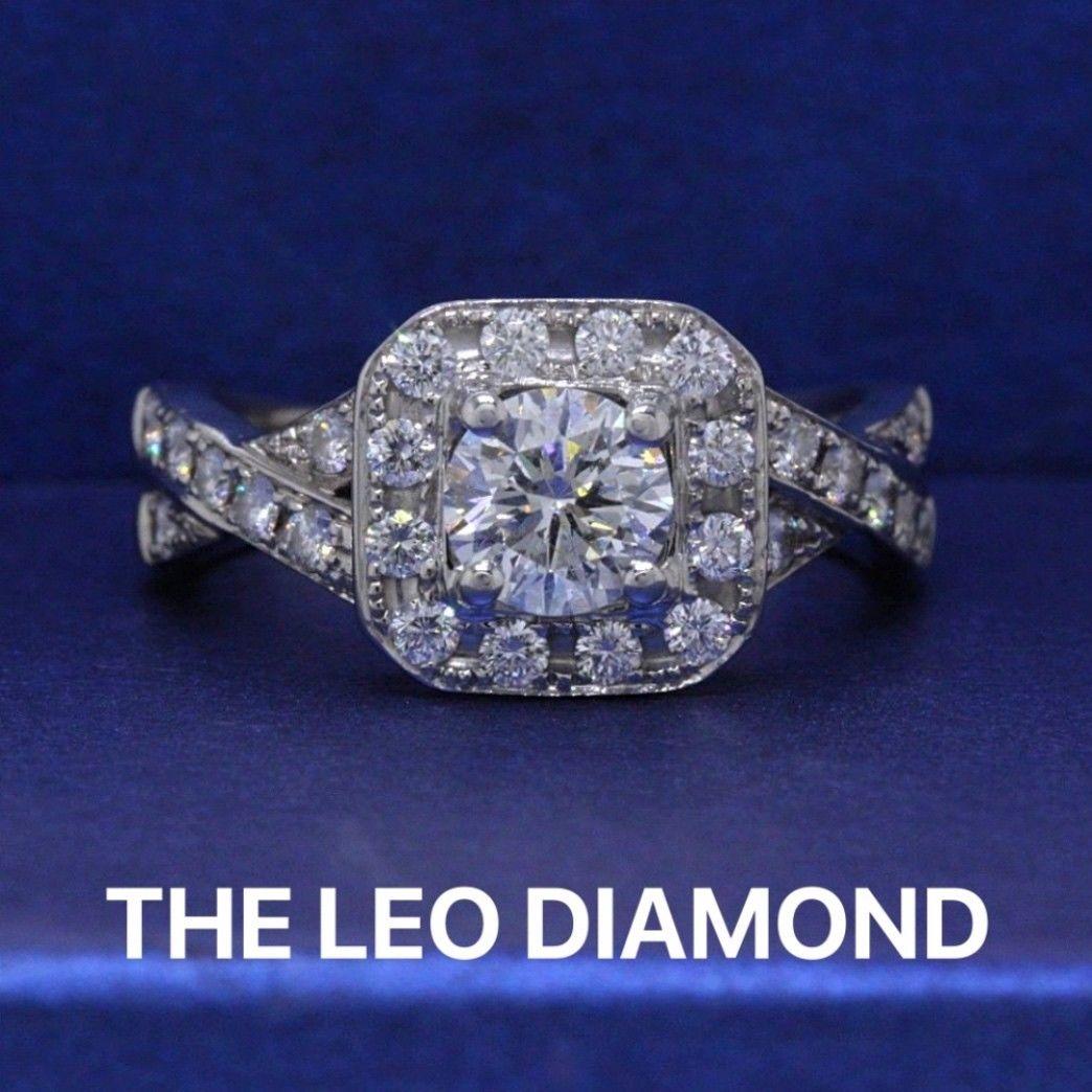 THE LEO DIAMOND ENGAGEMENT RING
Style:  Halo Twist Pave Diamonds
Serial Number:  LEO 010180199
Certificate:  GSI # 3840200401
Metal: 14KT White Gold
Size:  7.0 - Sizable 
Total Carat Weight:  1.23 TCW
Diamond Shape:  Leo Round 0.73 CTS
Diamond Color