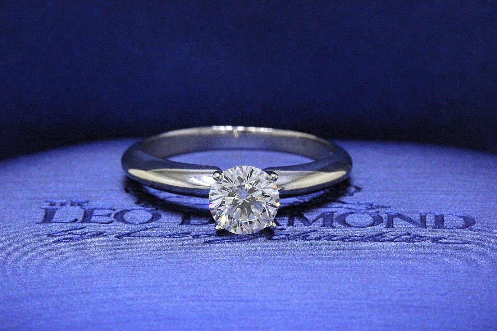 THE LEO DIAMOND SOLITAIRE ENGAGEMENT RING
Style:  4 - Prong Solitaire
Serial Number:  LEO211045
Certificate:  IGI # 33378743
Metal: 14K White Gold
Size:  5 - Sizable 
Total Carat Weight:  0.67 CTS
Diamond Shape:  Leo Round
Diamond Color & Clarity: 