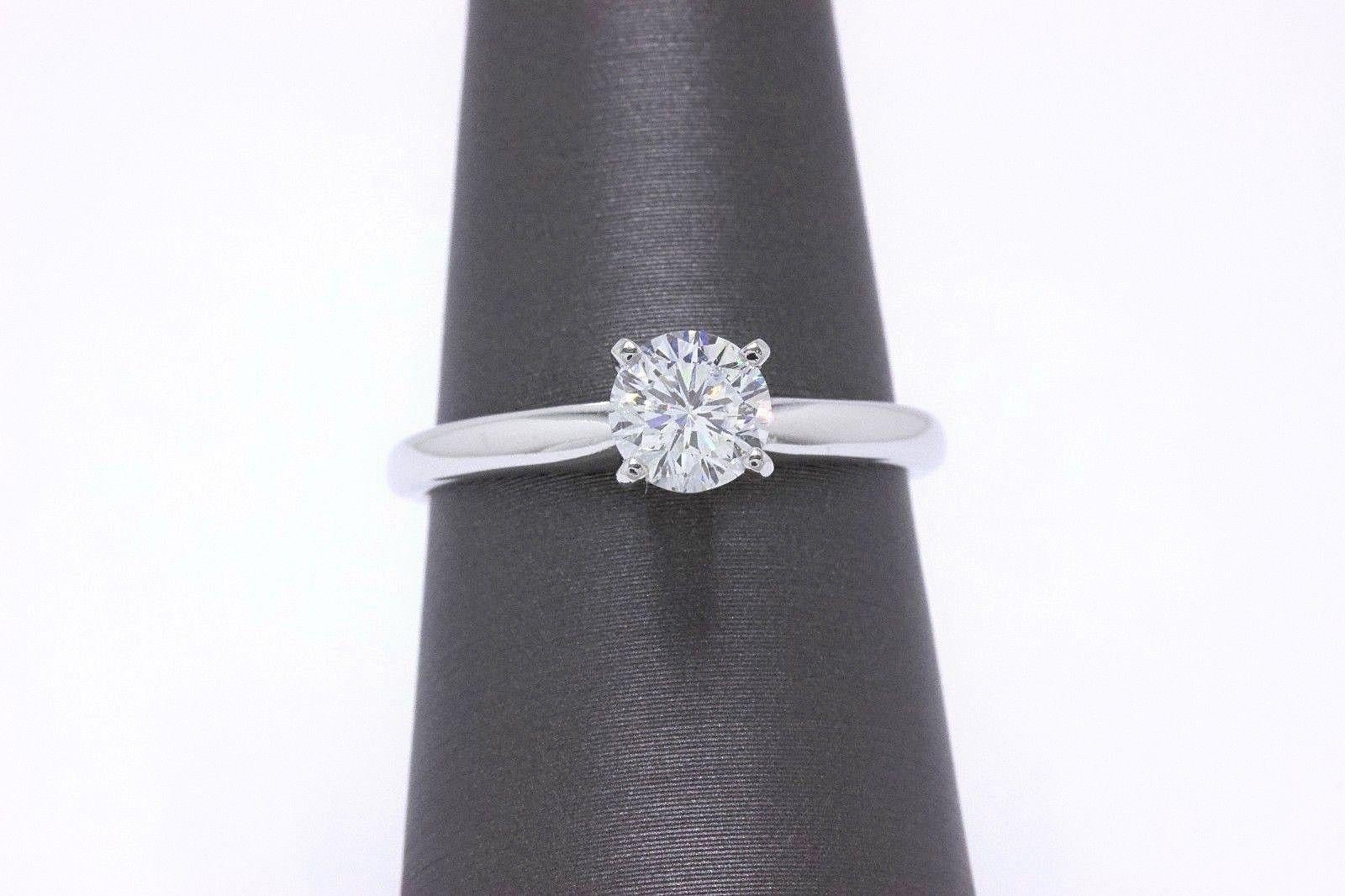 THE LEO DIAMOND SOLITAIRE ENGAGEMENT RING
Style:  4 - Prong Solitaire
Serial Number:  LEO266755
Certificate:  IGI # 6431100115
Metal: 14KT White Gold
Size:  6.75 - Sizable 
Total Carat Weight:  0.69 CTS
Diamond Shape:  Leo Round
Diamond Color &