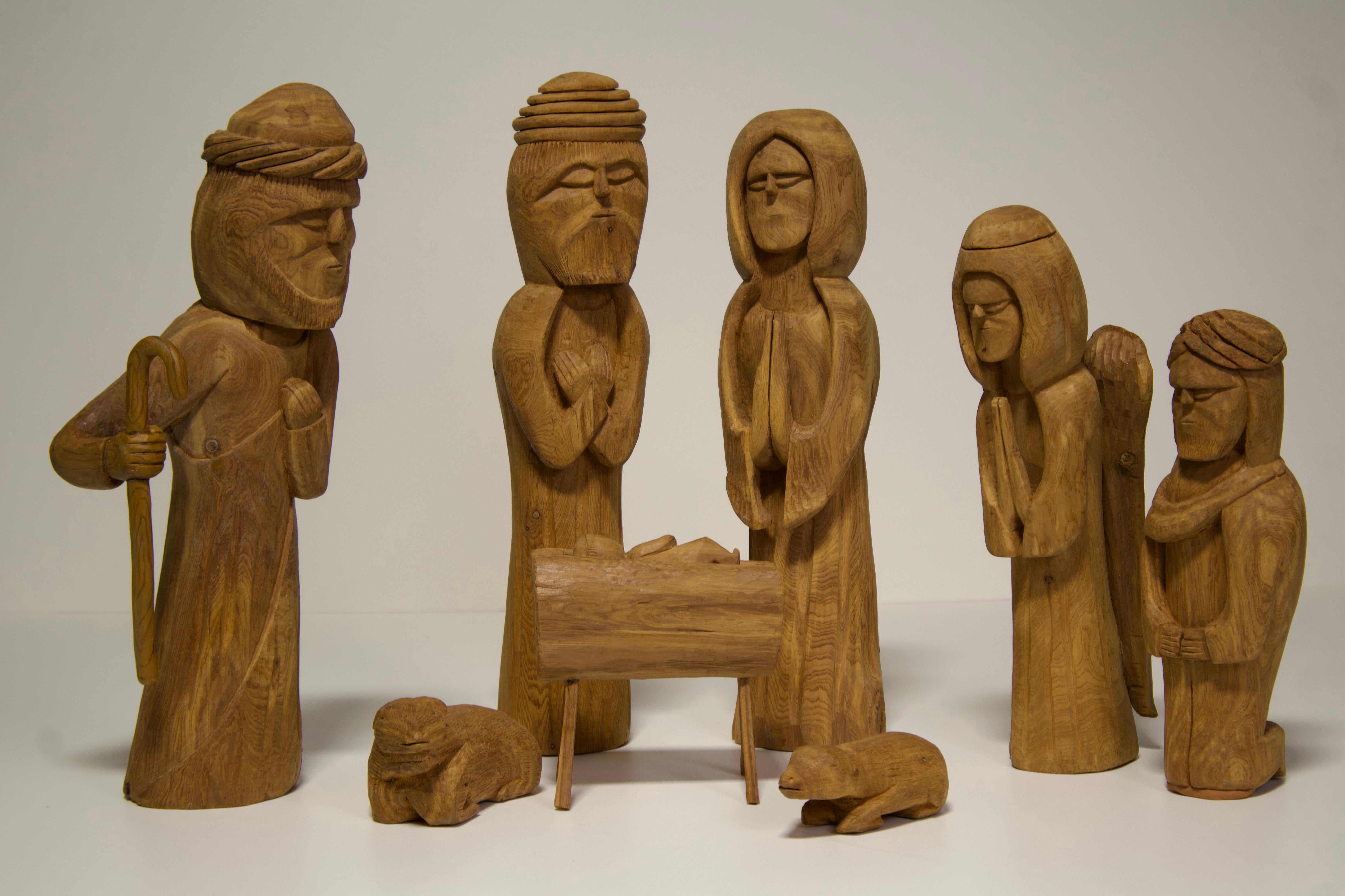 Nativity Scene with Blessed Mary, Kneeling Joseph, Angel, One Shepherd, One King, Manger, Baby Jesus, and Two Animals. The figures  range in height from 18.5" to 12"; animals are 3" x 6" and 2" x 5.5"; manger and infant 6.5" x 6.5" x 3". The pieces
