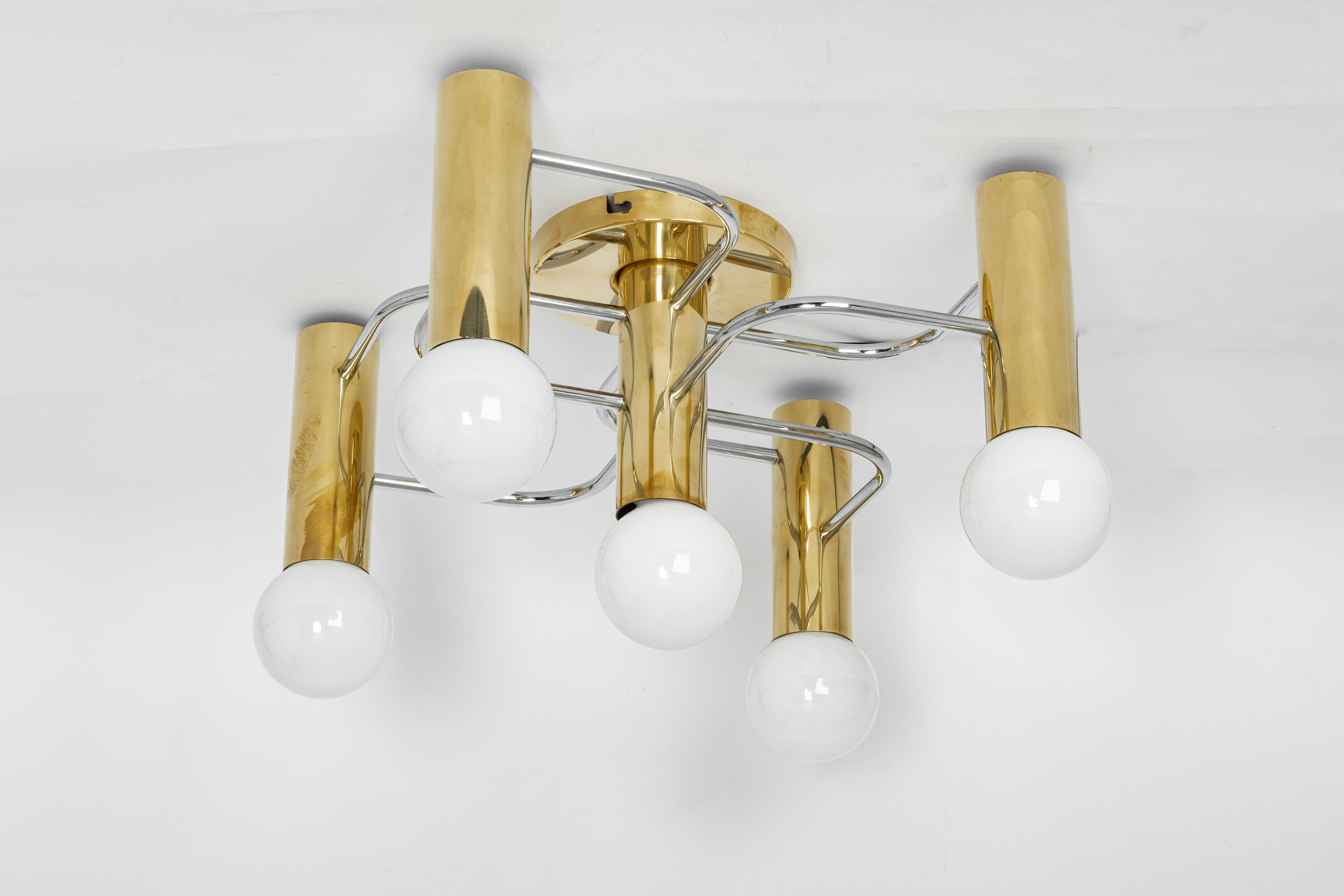 Stunning five-light flush mount light fixture in bi-color brass and chrome can be used as wall or ceiling light.

Sockets: 5 x E27 standard bulbs - max 60 watts each
Light bulbs are not included. It is possible to install this fixture in all