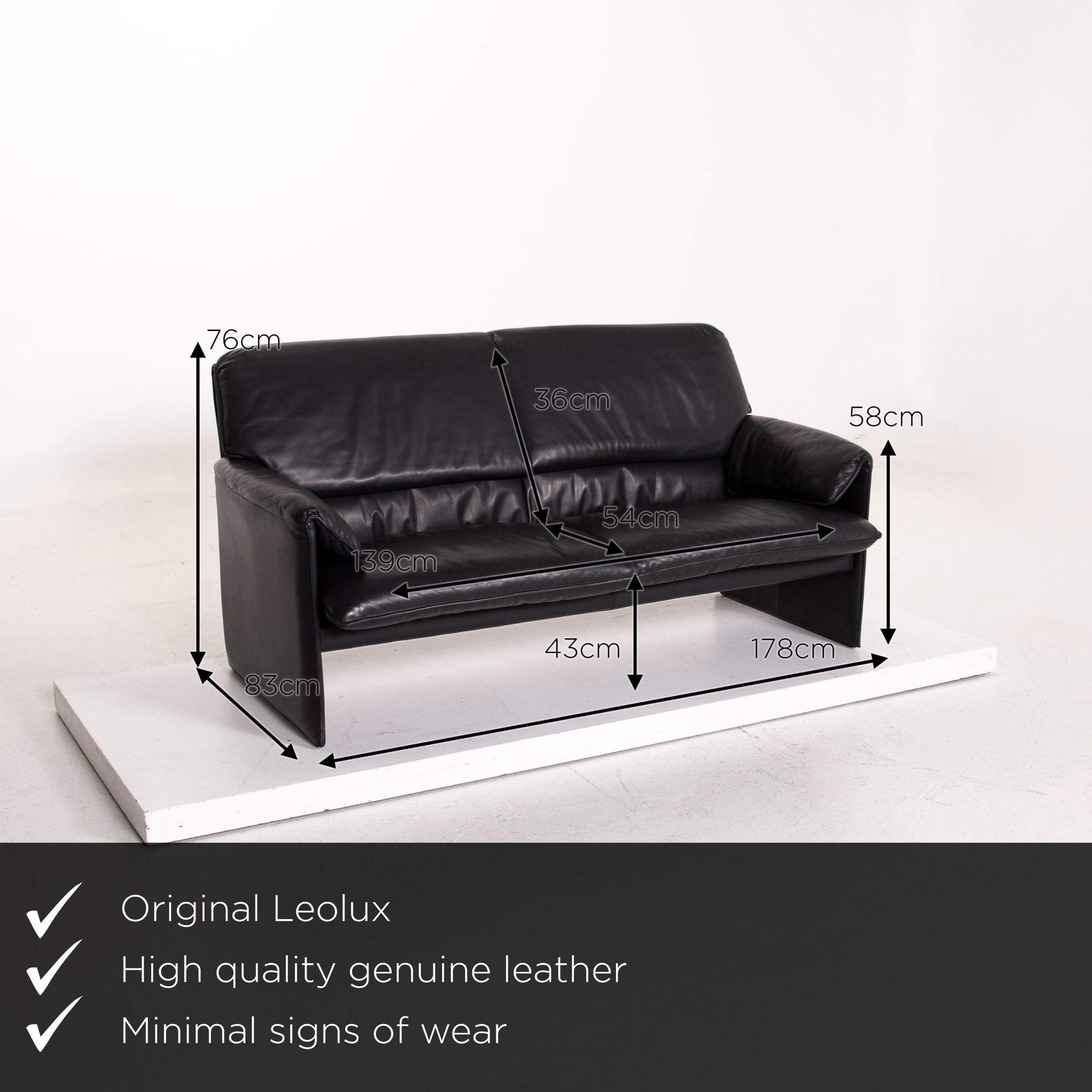 We present to you a Leolux Bora leather sofa black two-seat couch.
 
 

 Product measurements in centimetres:
 

 depth: 83
 width: 178
 height: 76
 seat height: 43
 rest height: 58
 seat depth: 54
 seat width: 139
 back height: 36.